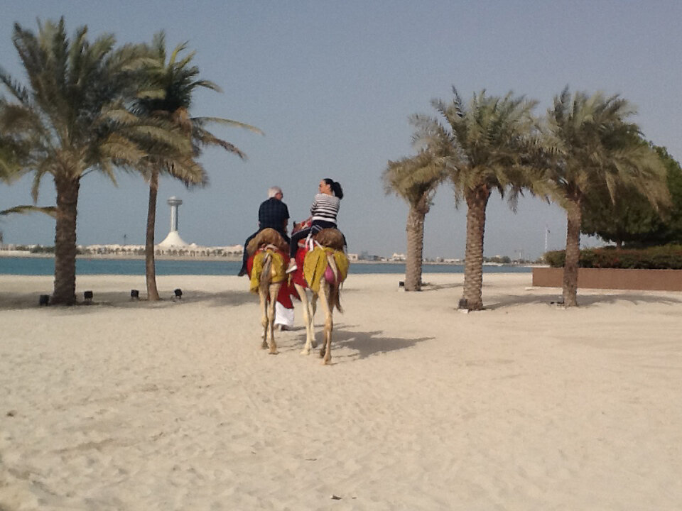  Michelle and me on a morning camel ride in Abu Dhabi. 