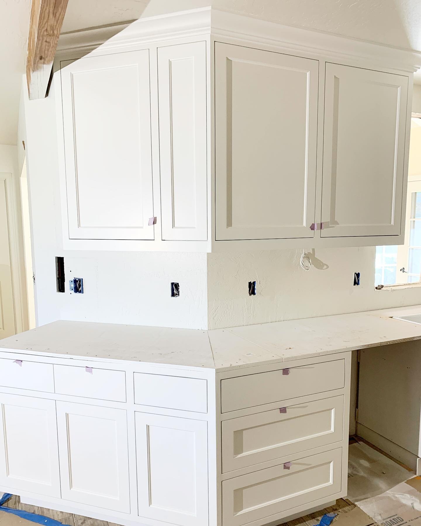 Close to being finished on this kitchen. Paint grade with stained accents