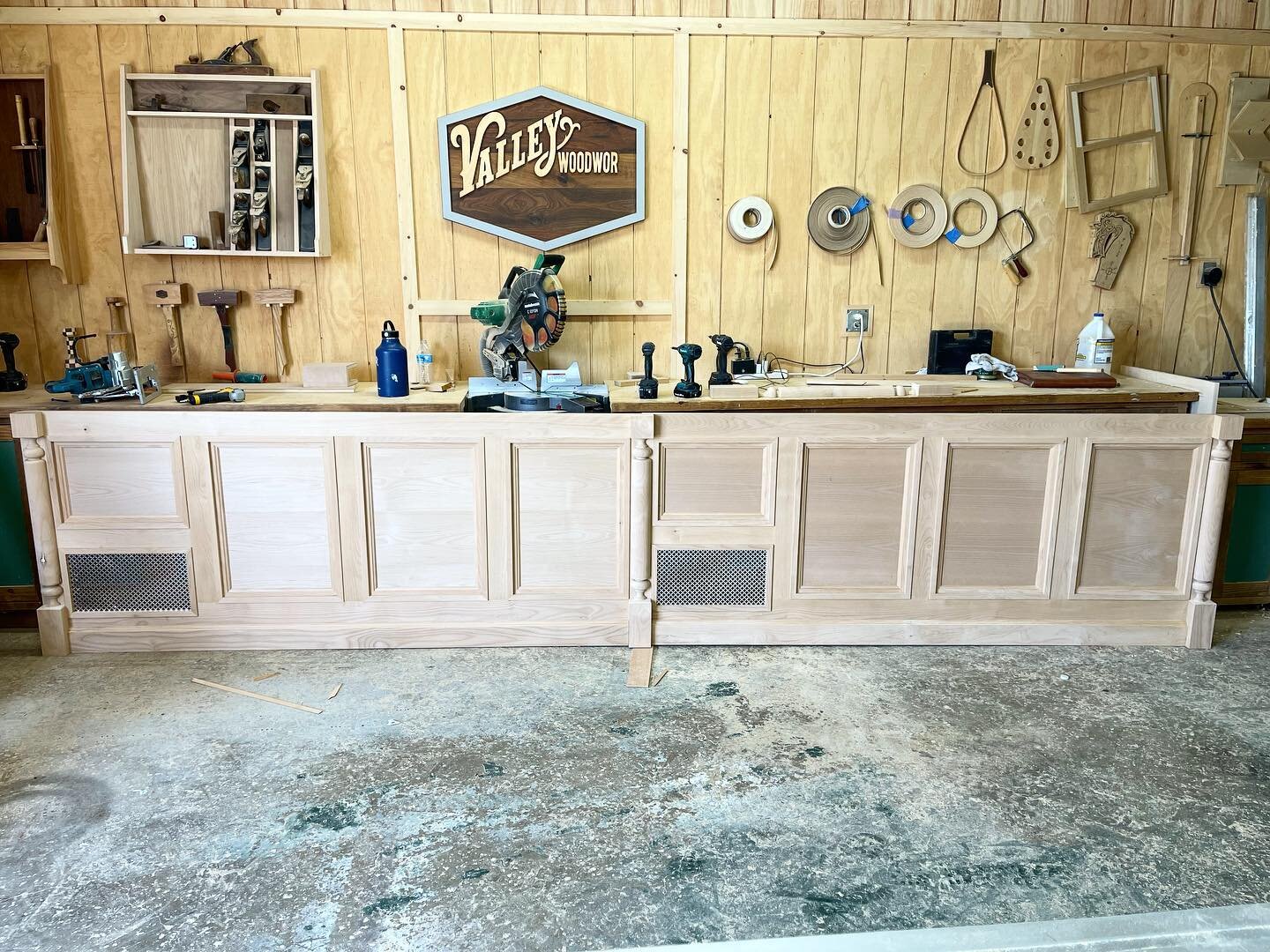 Fifteen foot freezer facade with custom turned legs #customcarpentry #customcabintery #facade #woodturning #customturnedlegs #craftsmen #carpentry #ojai #ojaiicecream