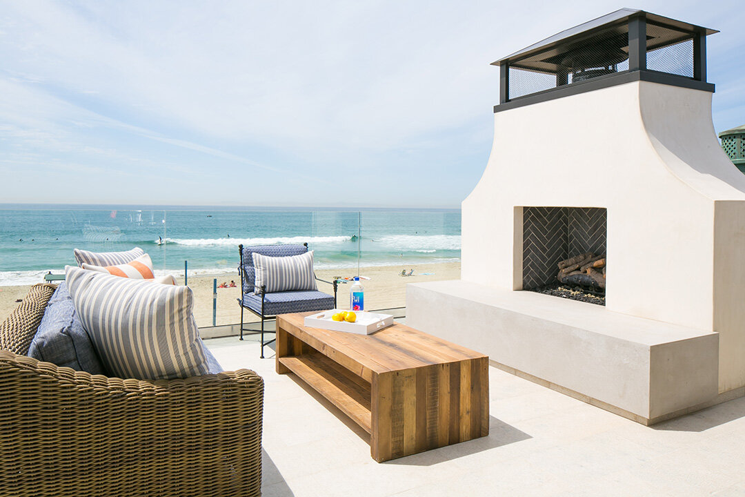 Enjoy a nice cozy fire after a long day of playing in the sand! 
----------------------------------------------------------------------
Photo By: @ryangarvin
Design By: @kellynutdesign
#legacyhomesoc 
#newportbeach #oc #orangecounty