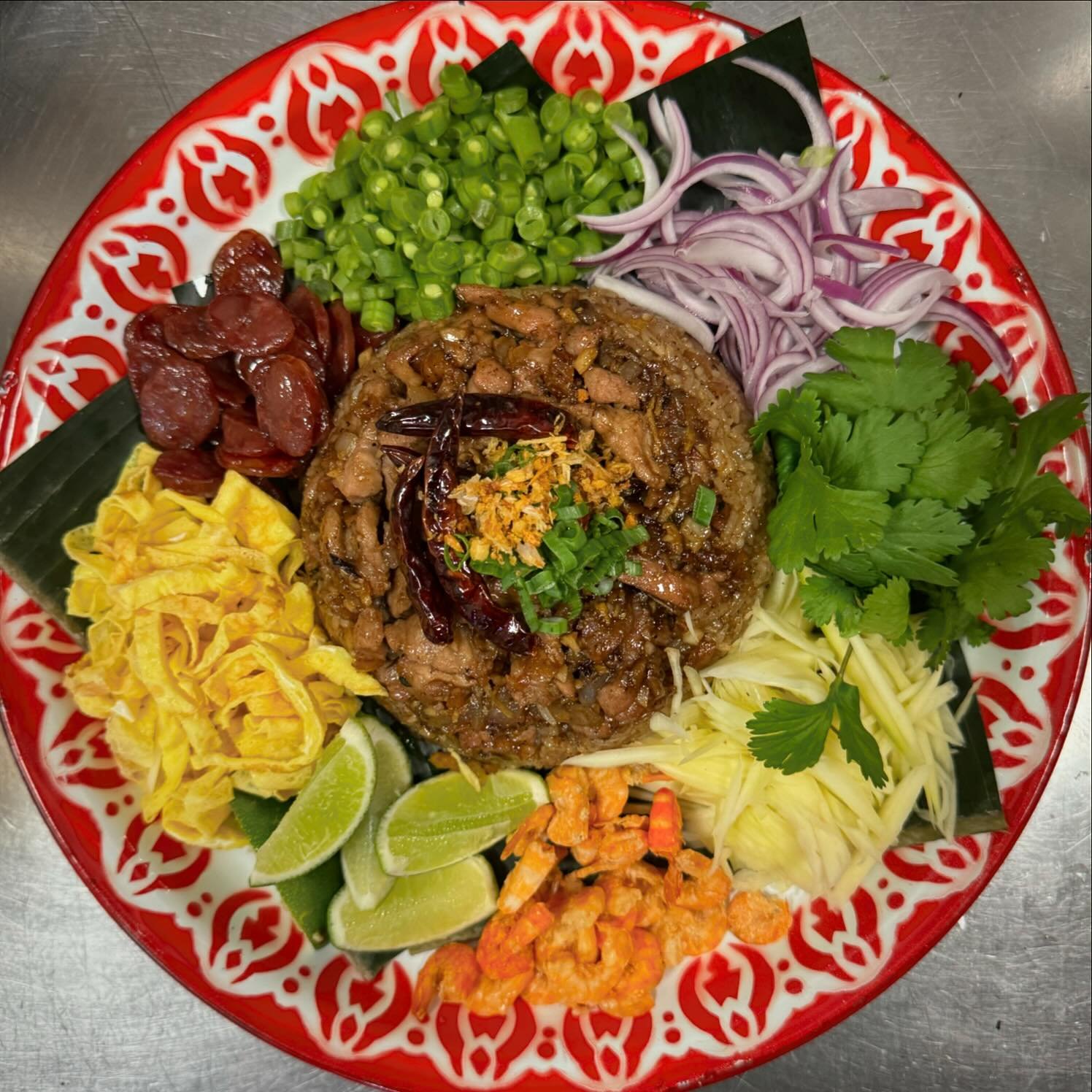 Our new menu now features a 
&ldquo;Large Platters&rdquo; section that includes options to add to your family style dining experience.  Like this Khao Kluk Grapi&hellip;

There&rsquo;s fried rice and then there&rsquo;s this!

Khao Kluk Grapi is a shr