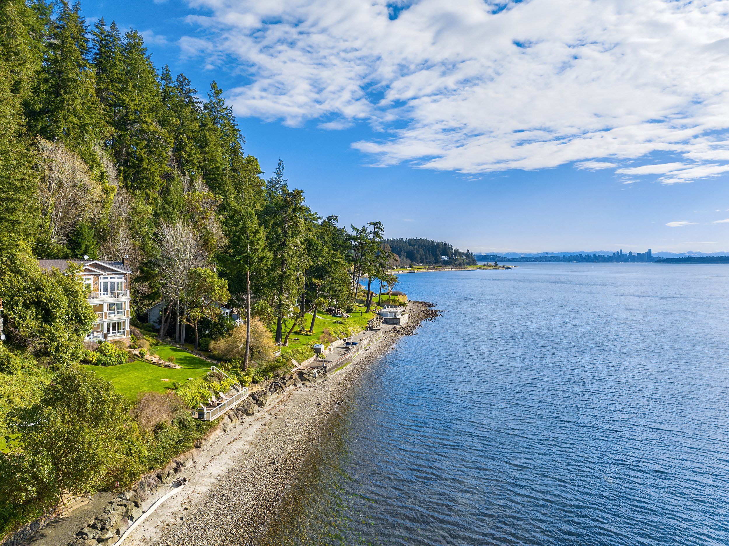  This waterfront home on Bainbridge Island listed for sale by Danny Varona, of Realogics Sotheby’s International Realty has a view of Mt Rainier and the Seattle skyline. 