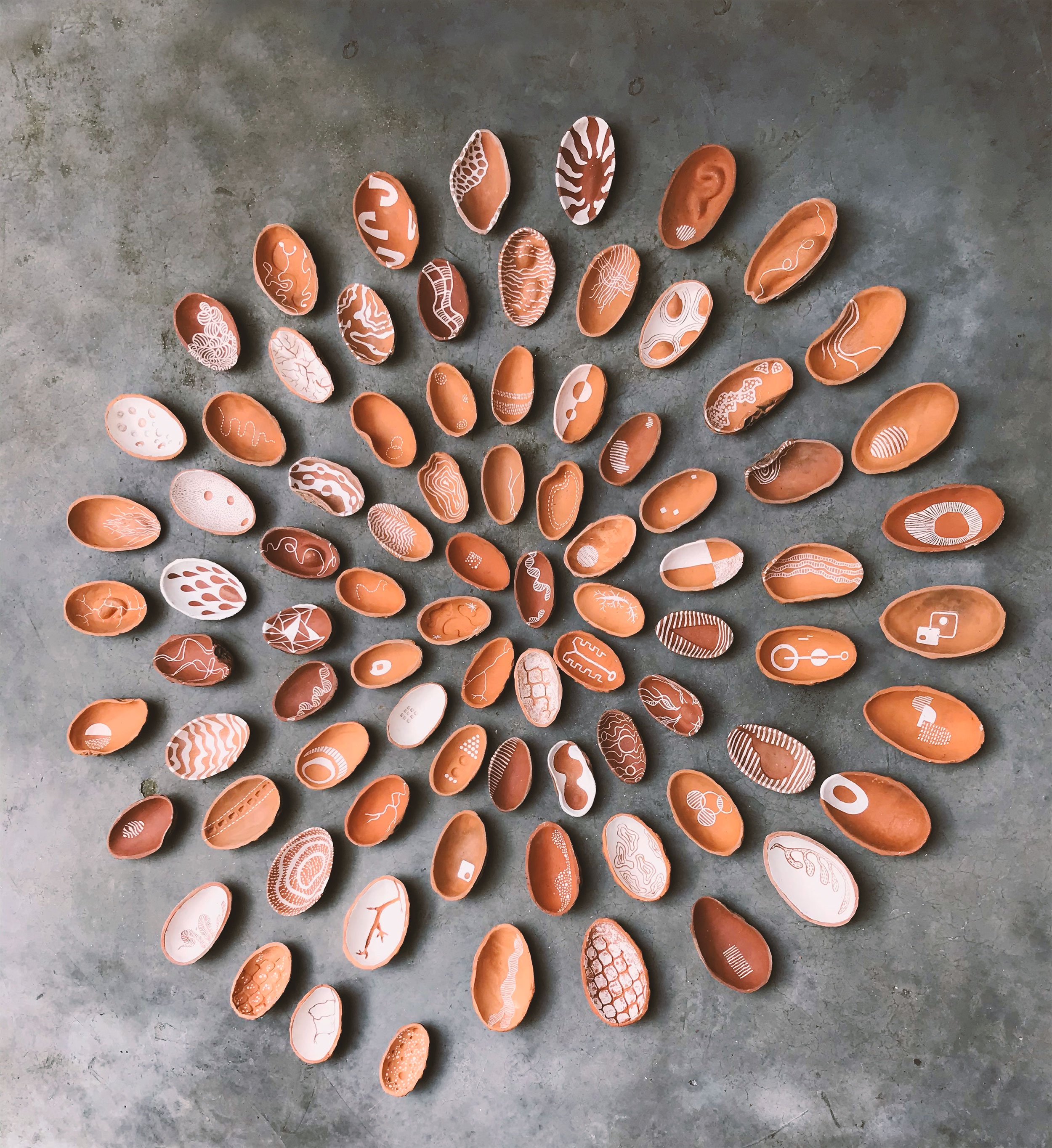 Ela Mukherjee , 'Meanderings' 2021-22, Ceramic installation.jpg