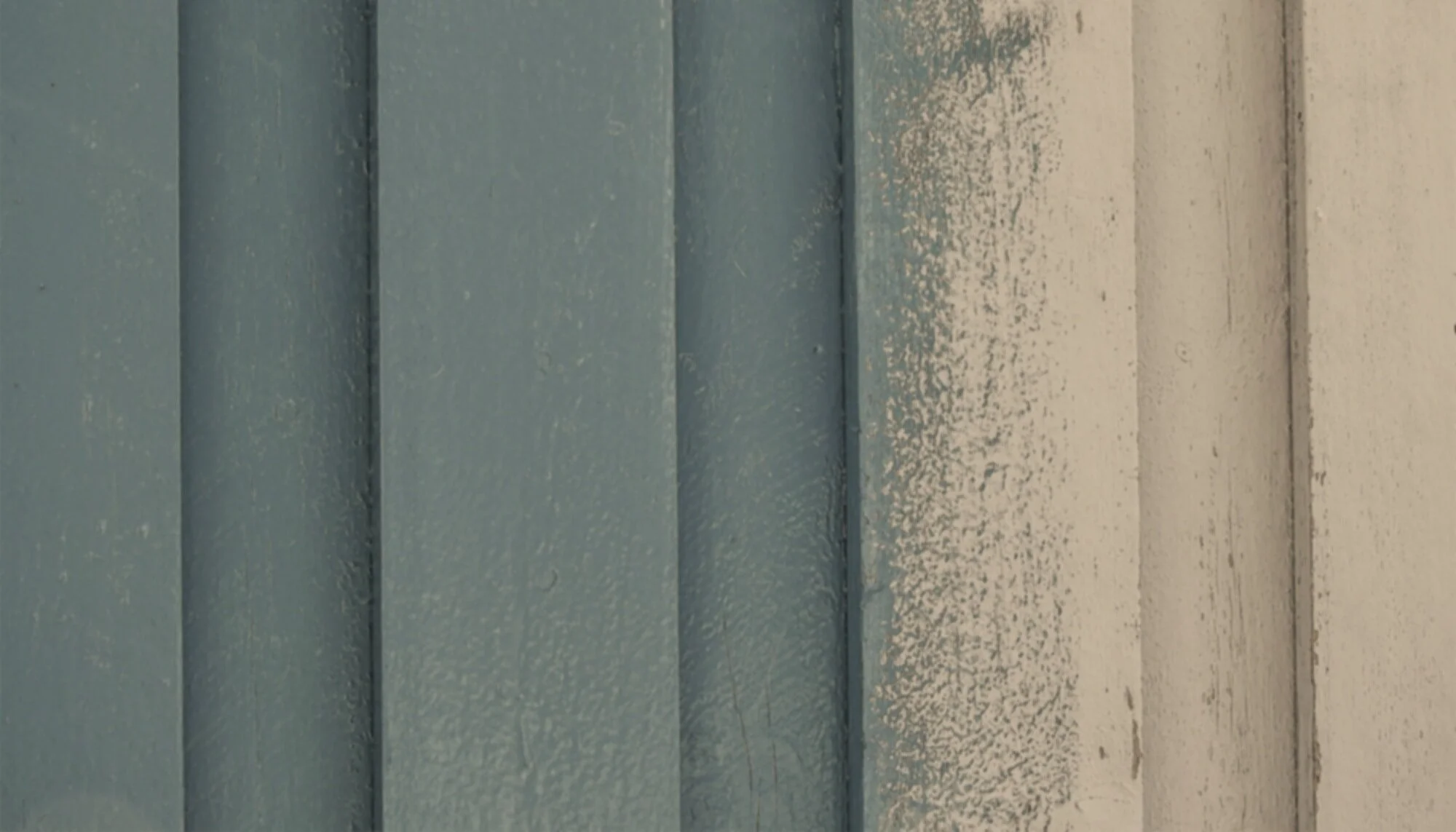 Canva---Wooden-Wall-with-Paint.jpg