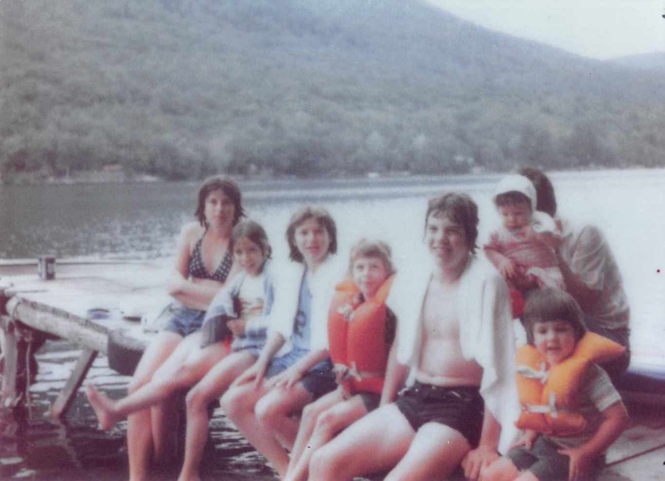 Kelly, me, Amy Arsenault, Jill and Lee Petrie, Tom Arsenault, and Joel Arsenault held by my father