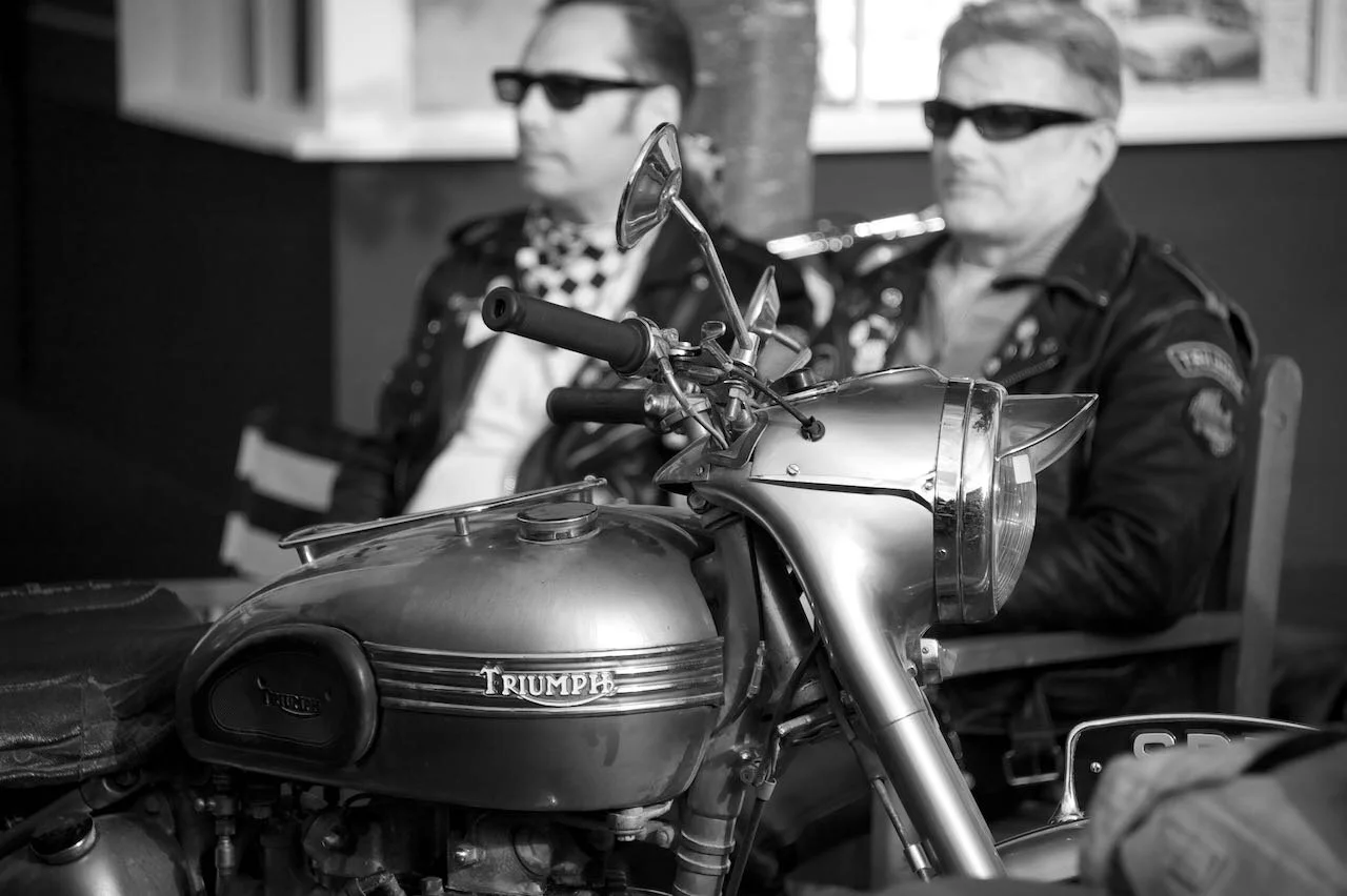 Rockers and Triumph motorbike - Goodwood Revival 2010
