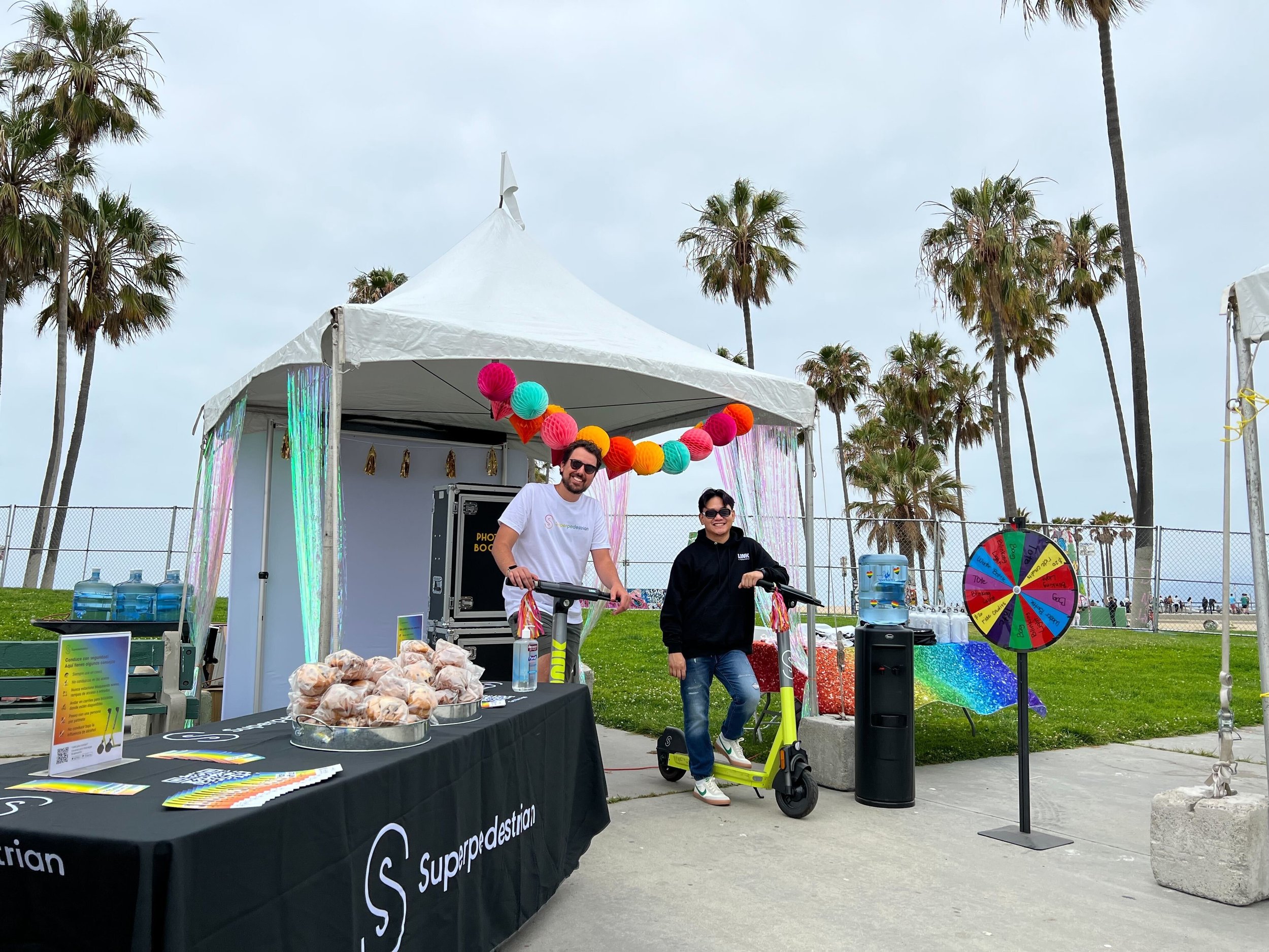 Celebrating at Venice Pride with giveaways, snacks, and rides