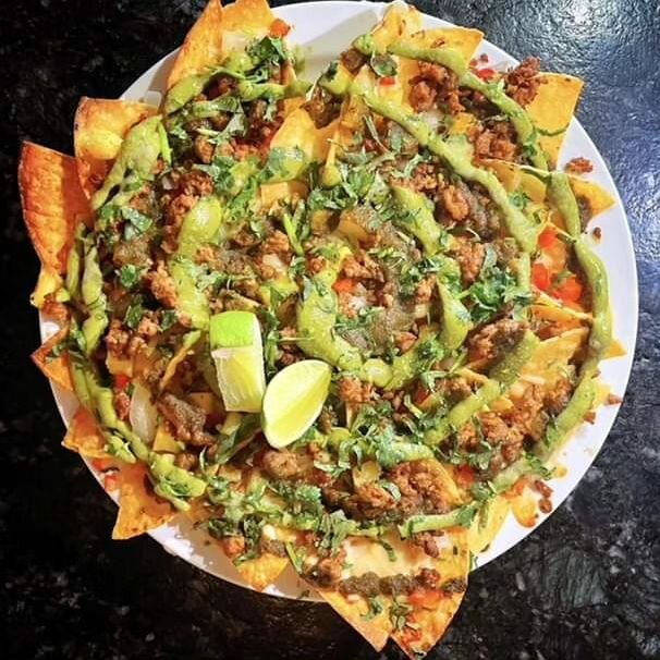 We've entered Foodie Saint John's #NachoWeek event and are excited to present our mouth-watering Mexican Street Nachos! 🇲🇽

Made with crispy corn chips, grilled pineapple, Mexican chorizo sausage, melted Monterey jack cheese, fresh peppers and onio