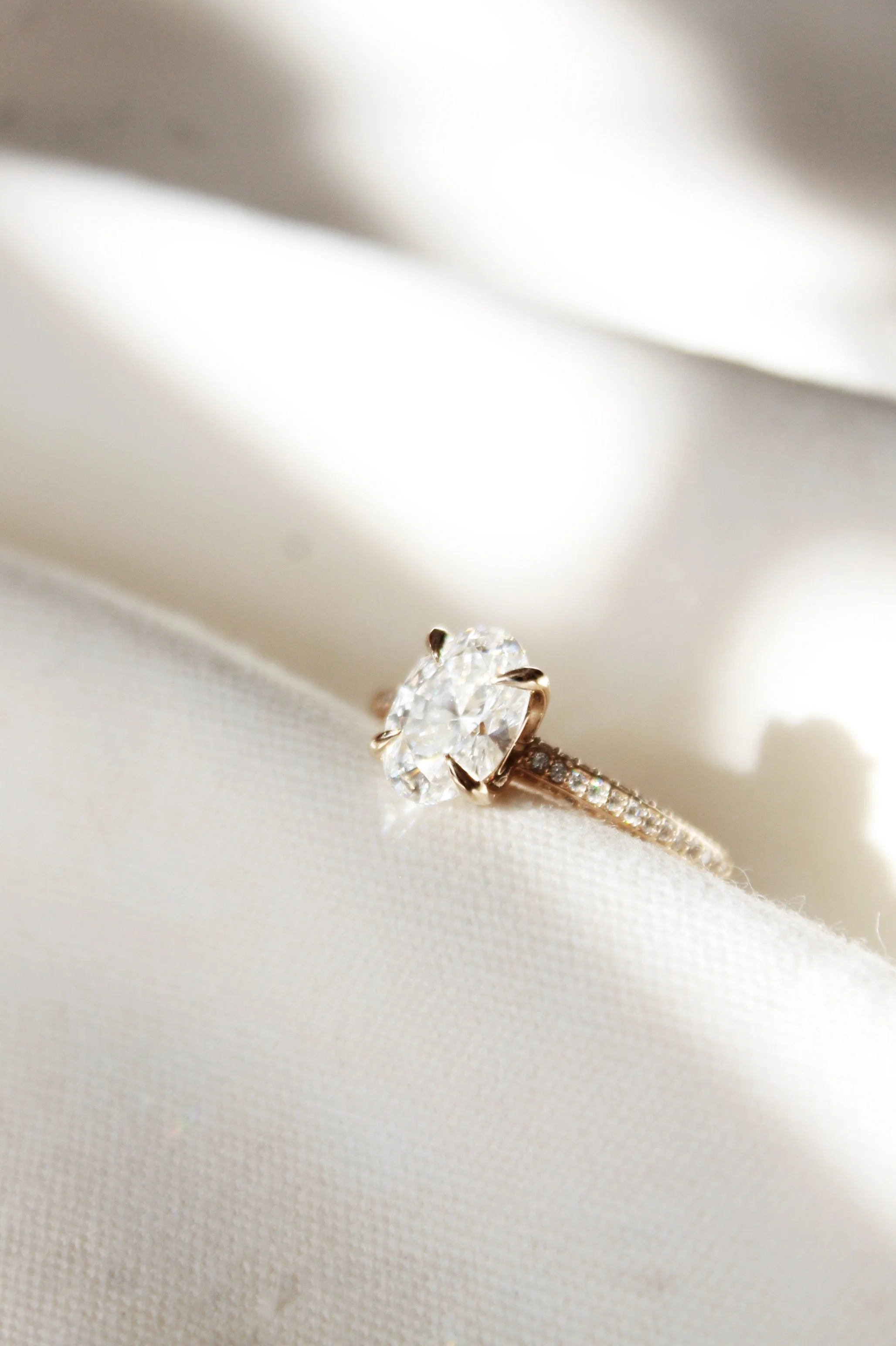 14k Yellow Gold Oval Solitaire (with 74 Diamonds Lining Shank)