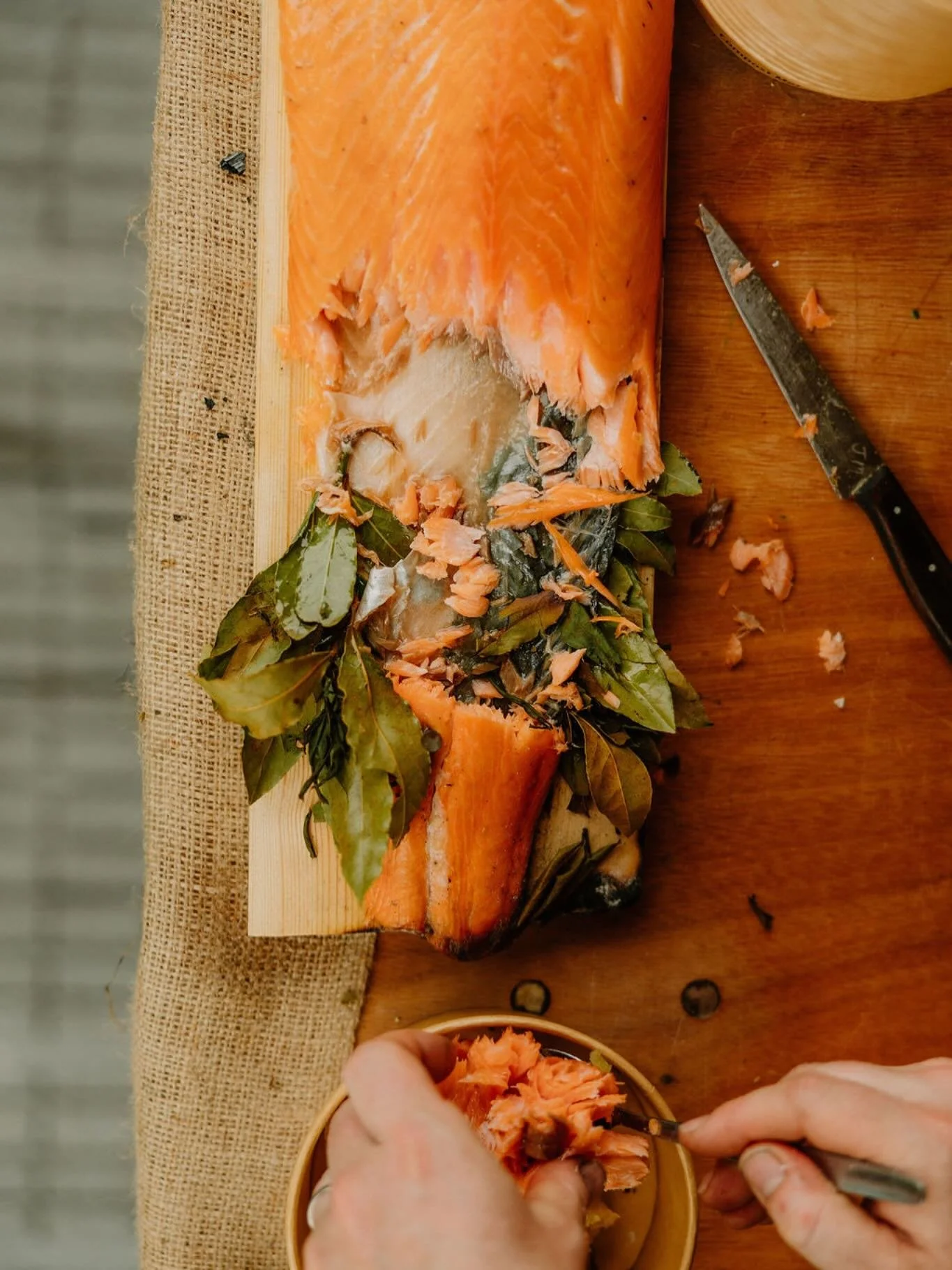 Plank salmon 🐟 has been a staple at many of our events for a long time.  Slowly smoked and charred, nailed to a plank, cooked over burning coals.  Ace sharing starter with creme fraiche, salad and bread, or as part of a main course feast.  Smoky, sa