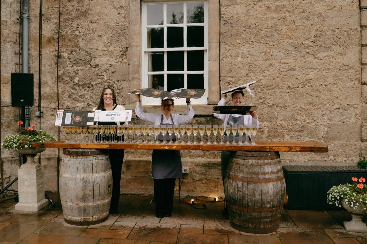 When the heavens open 10 seconds before your drinks reception, don&rsquo;t worry we&rsquo;ll get wet to protect the bubbles for you - grab a glass and head inside 🥂 

📸 @simonhirdweddings 
💒 @gilmertonhouse