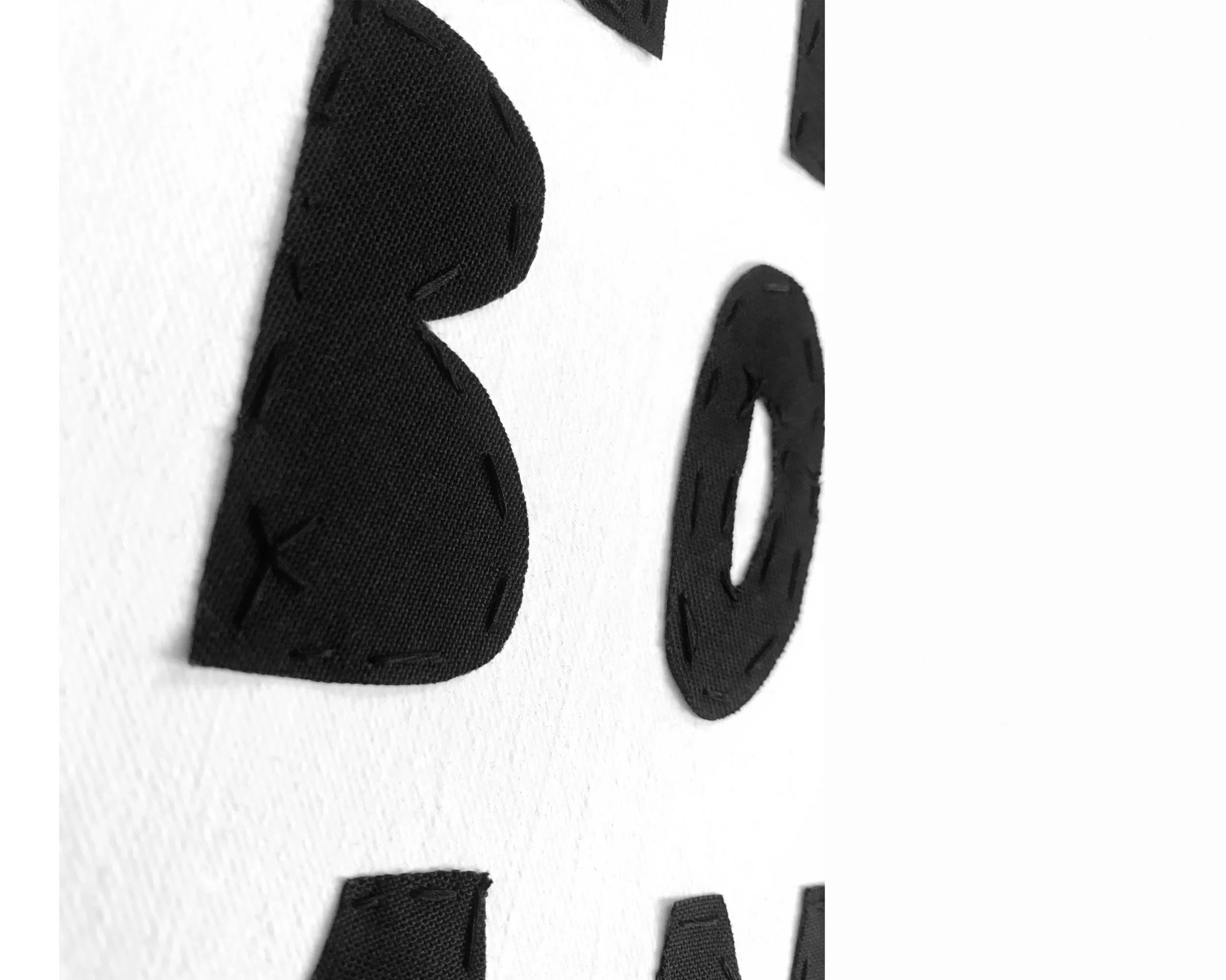            (detail)  Your Body is My Body + We Are a Museum , 2021   36 x 48 cm Sewn fabric on canvas                       Installed at  EIGENHEIM Berlin in das Kollektiv exhibition  for Berlin Art Week 2009.                                         