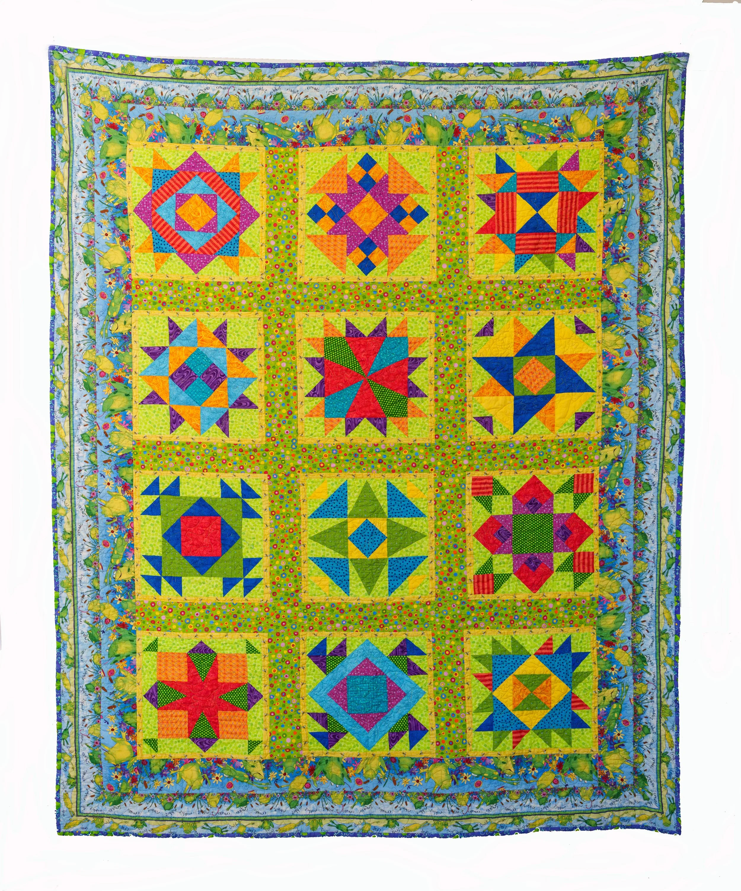 Bright Tangrams by Linda Fisher-Berlanga, Bend, OR 56" x 70"