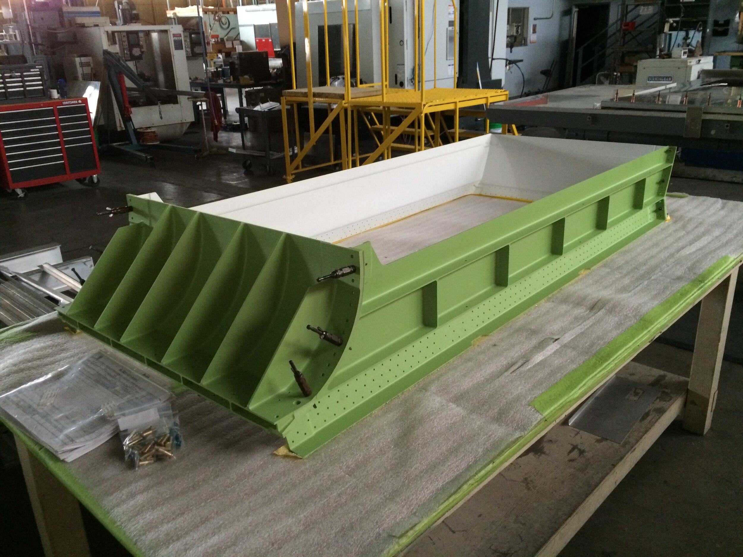  Custom reinforcement frame utilized in an Aerial Firefighting platform. All parts were machined from solid billet aluminum, primed and painted at Sel-Tech. 