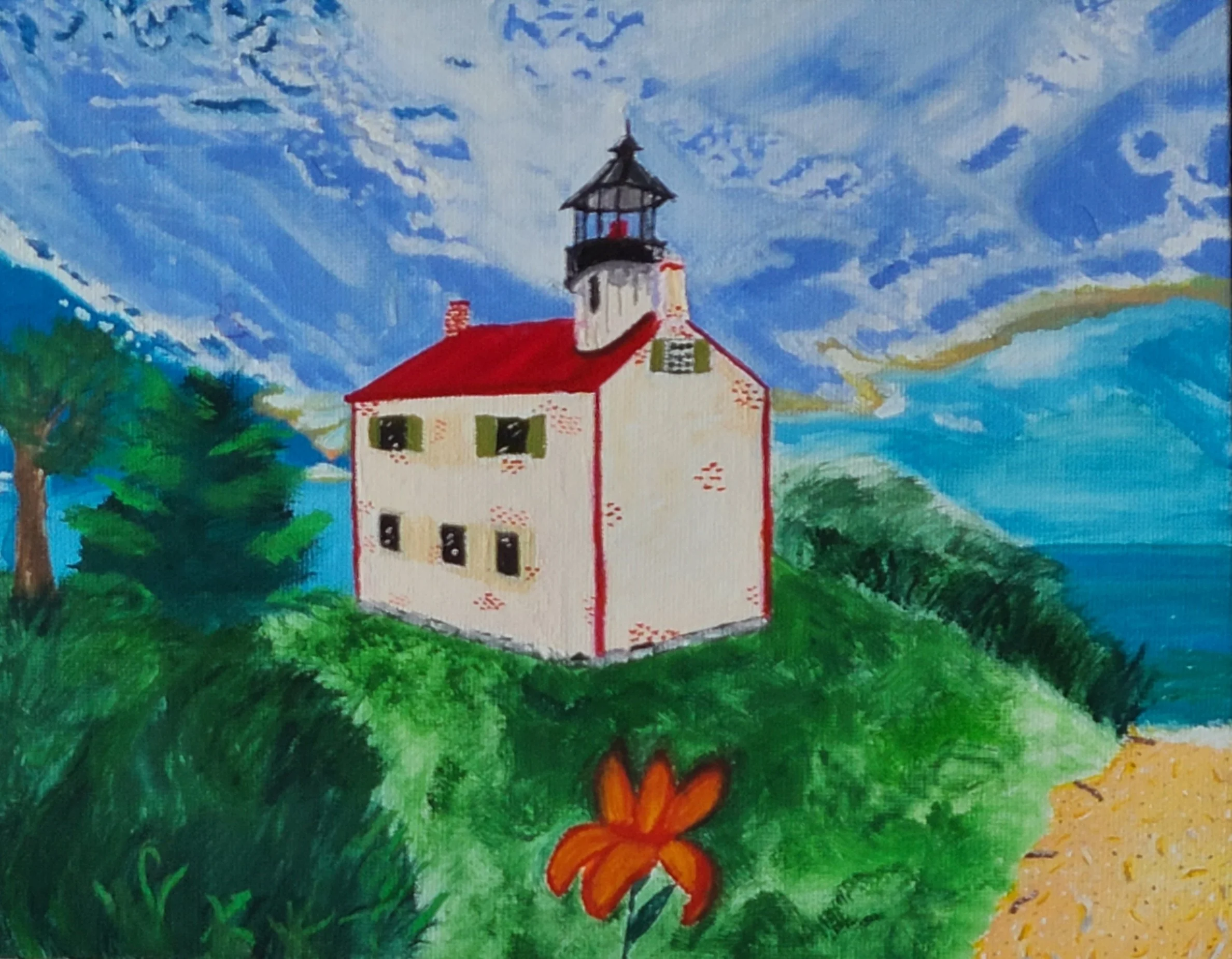 Two story lighthouse, red roof, beach path, green trees, grass, blue sky, orange flower