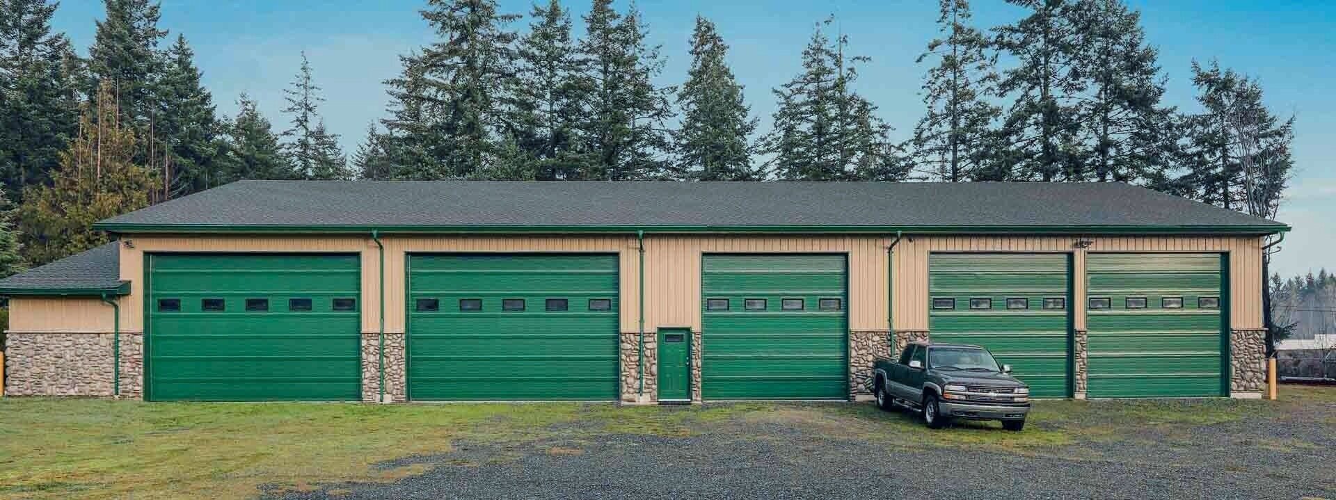 Large storage units with garage doors.