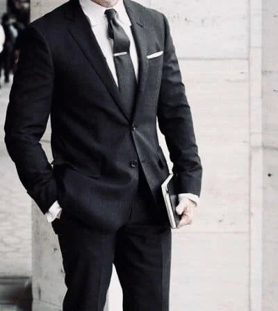 A Black Suit Shouldn't Be The Foundation of Your Wardrobe.