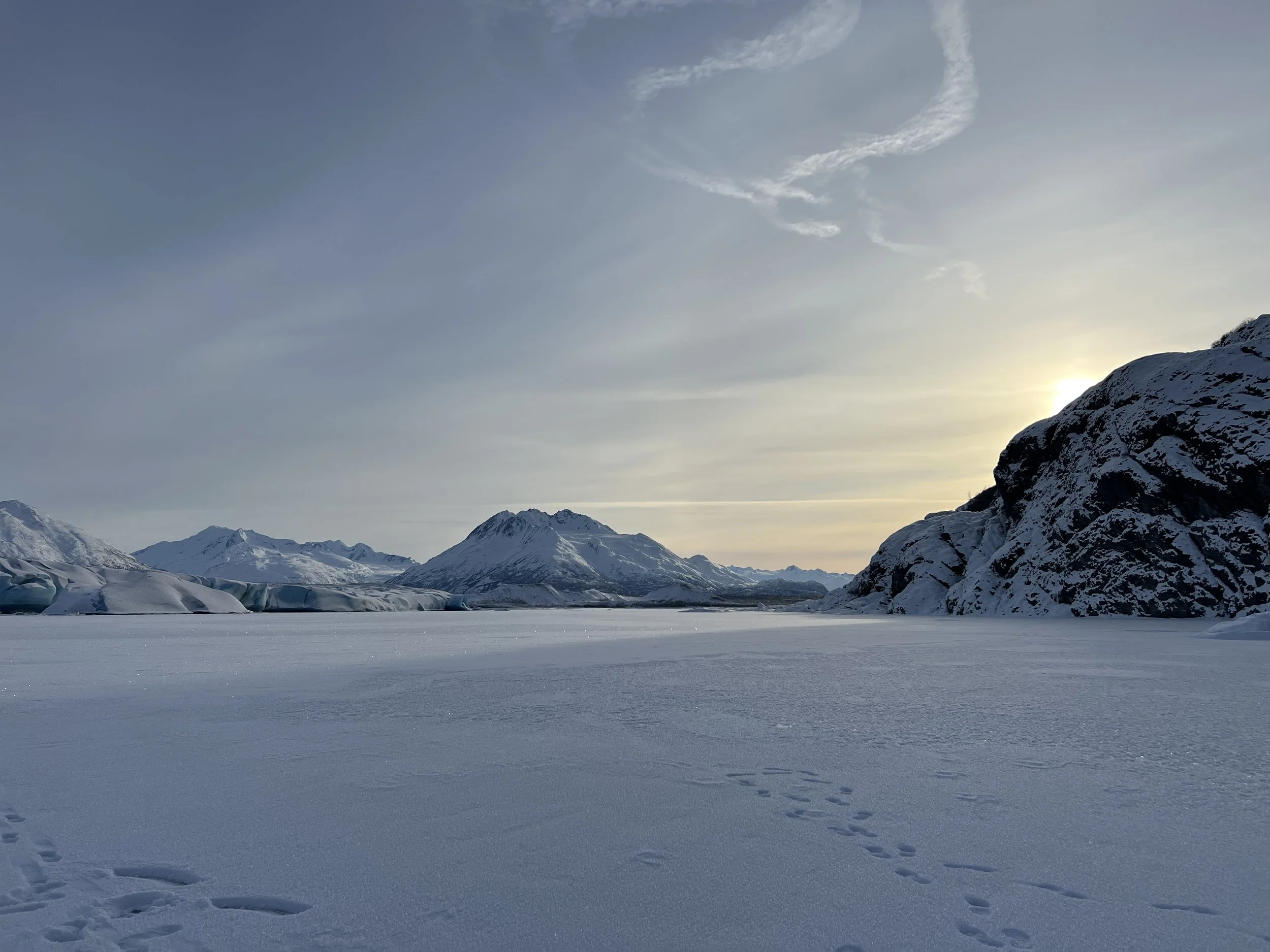 Scenic glacier landscape in Alaska during winter, highlighting the remote environments travelers experience on winter adventure trips.