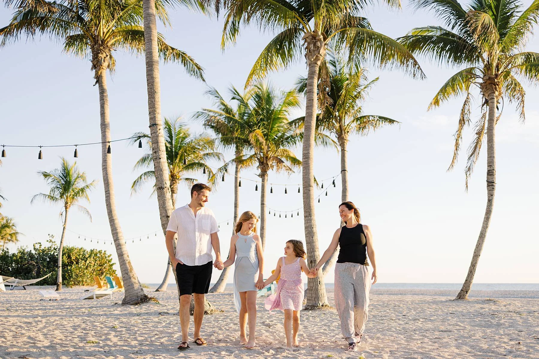 Family enjoying a calm, stress-free beach vacation together