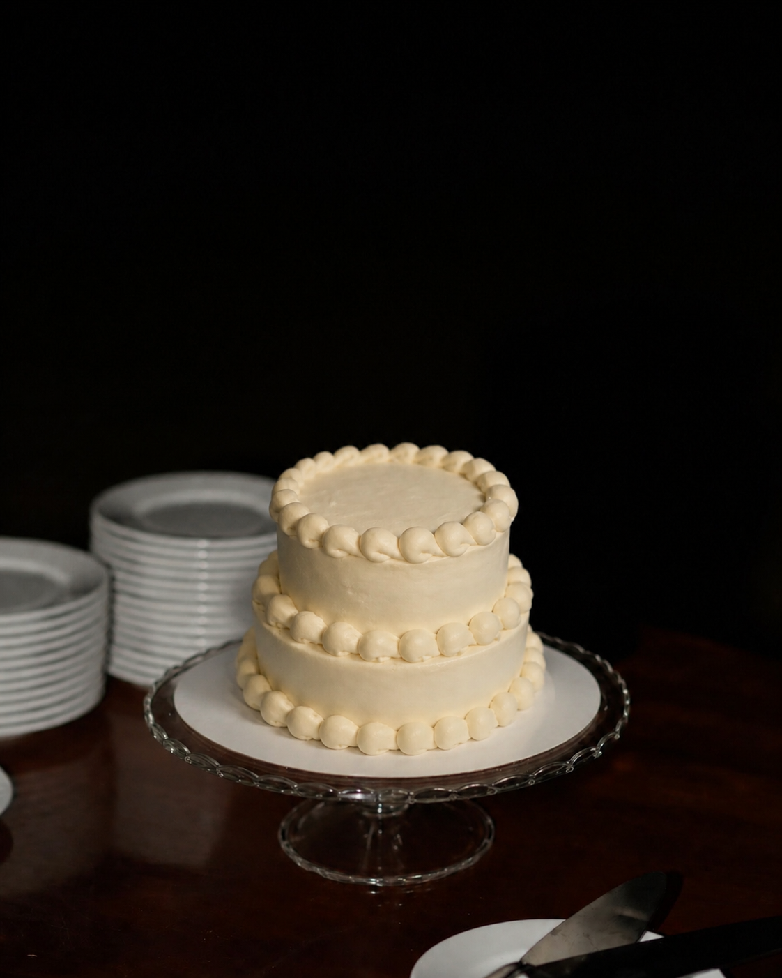 Home made birthday cake with  piped decoration on each tier.