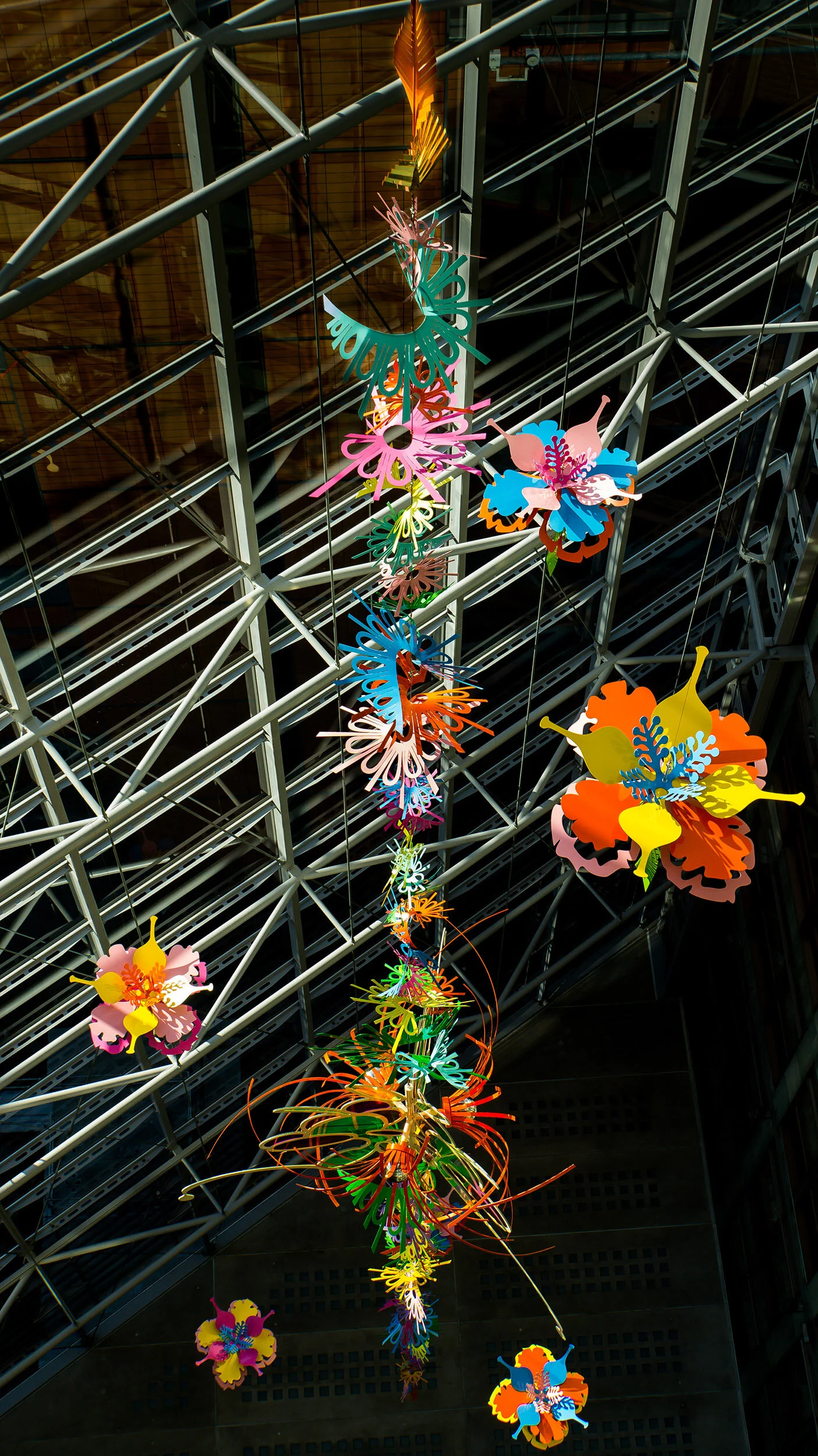 NHS hospital colorful permanent art therapy hanging flower sculpture installation atrium London