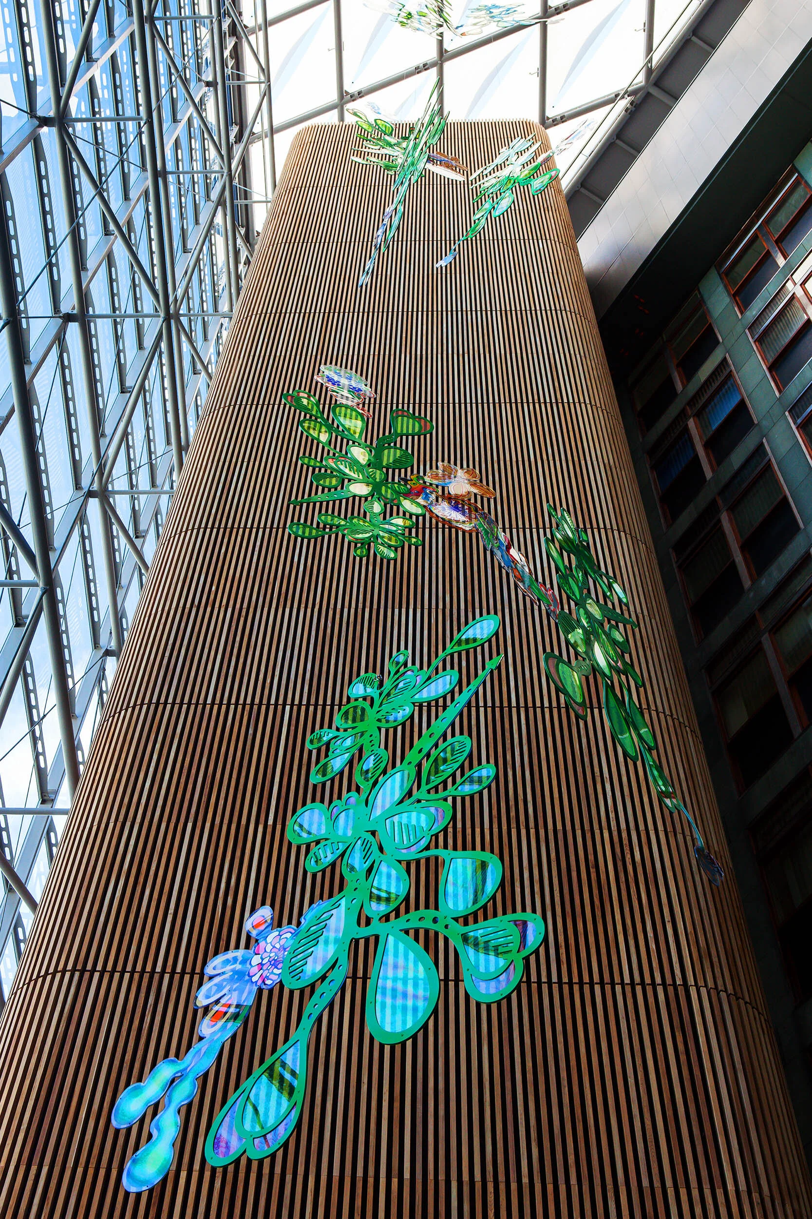 NHS hospital colorful permanent art therapy hanging flower sculpture installation atrium London