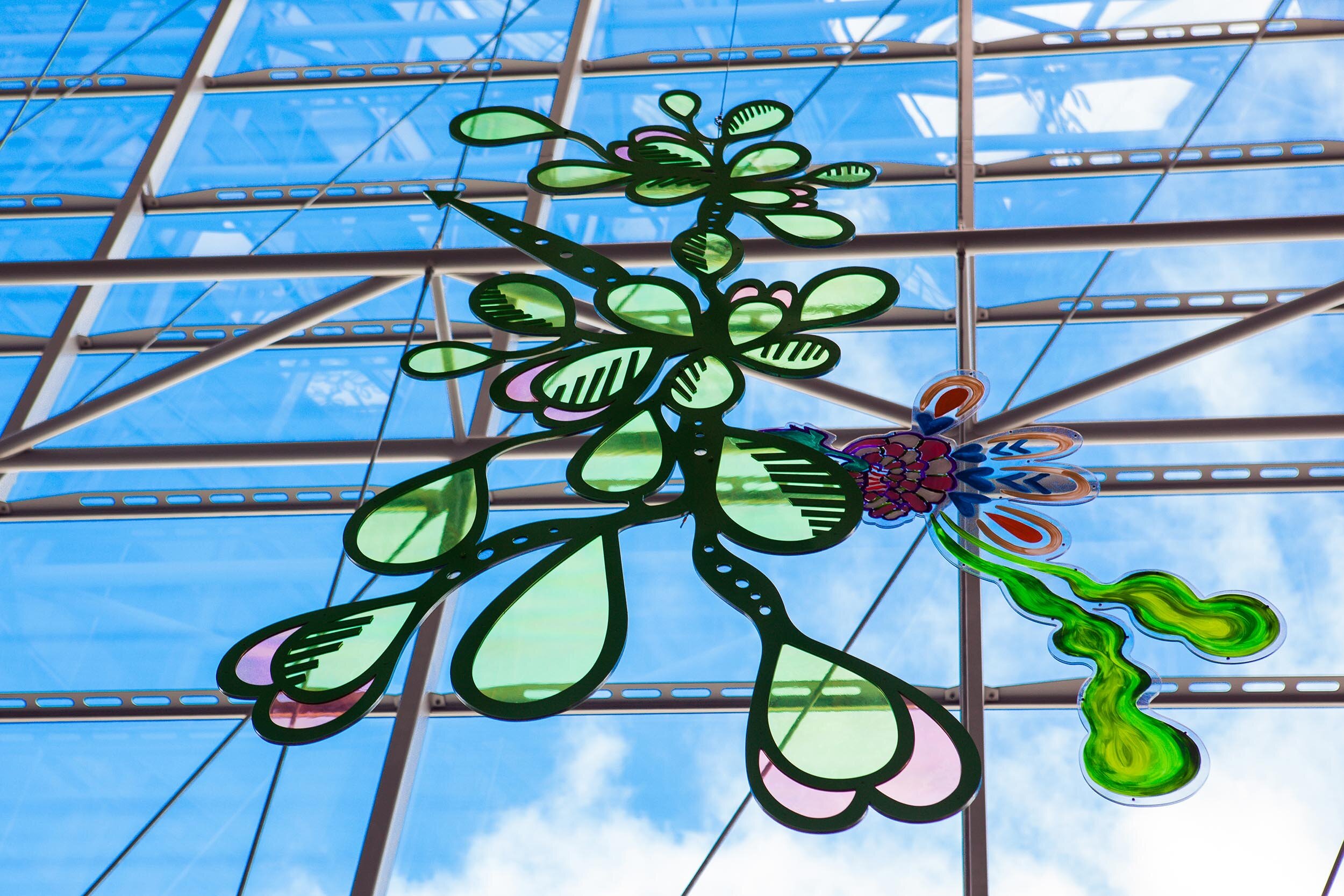 NHS hospital colorful permanent art therapy hanging flower sculpture installation atrium London