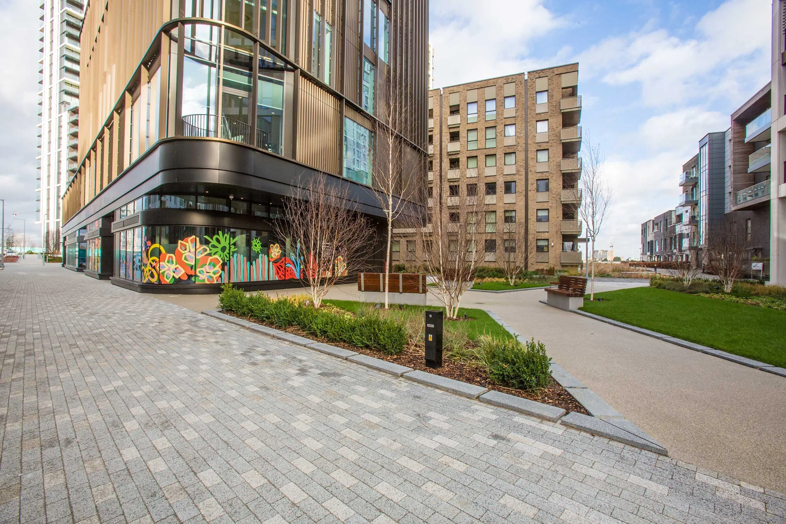 facade vinyl storefront display windows paintings art commission Greenwich Peninsula urban regeneration