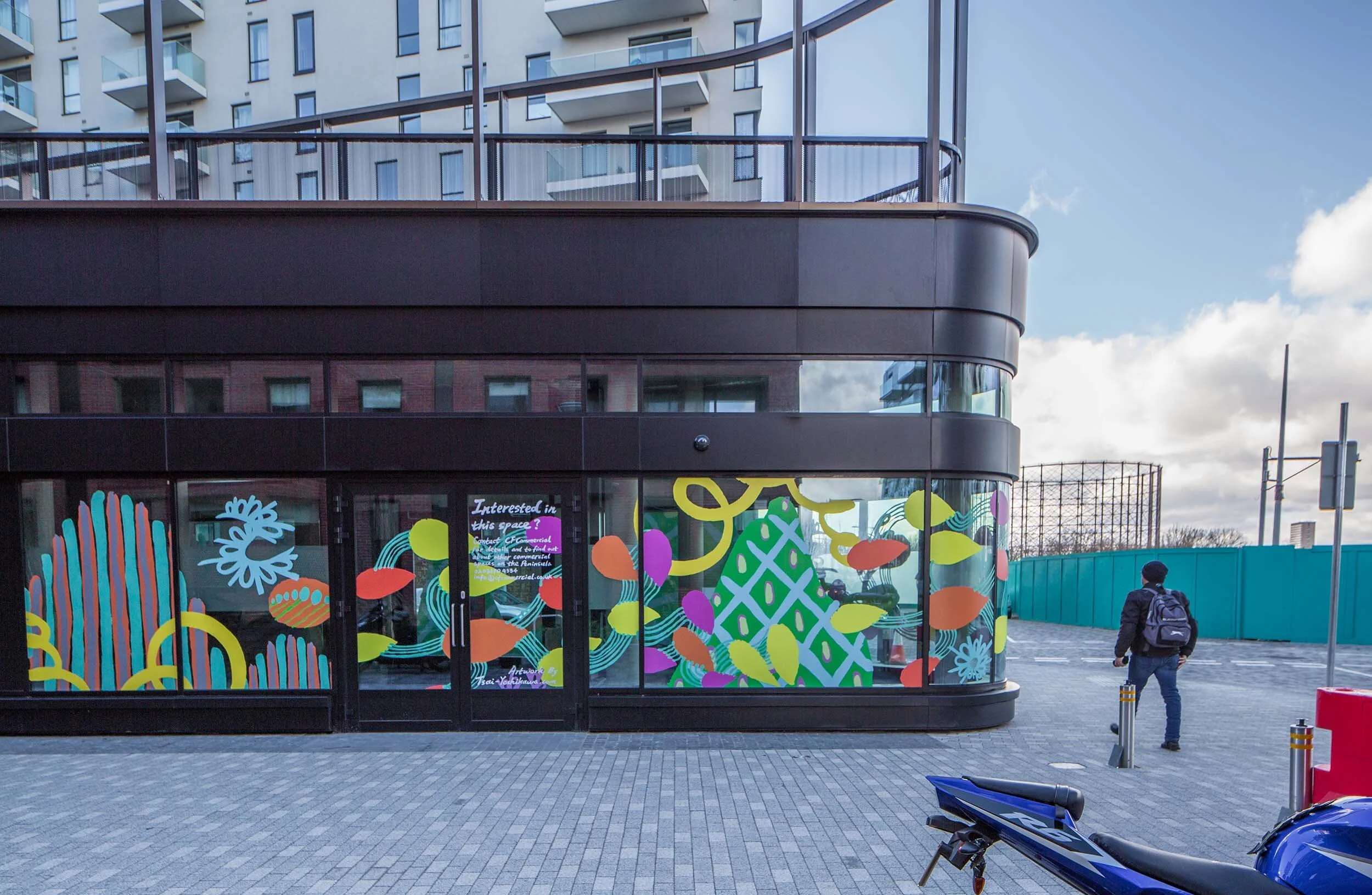 facade vinyl storefront display windows paintings art commission Greenwich Peninsula urban regeneration