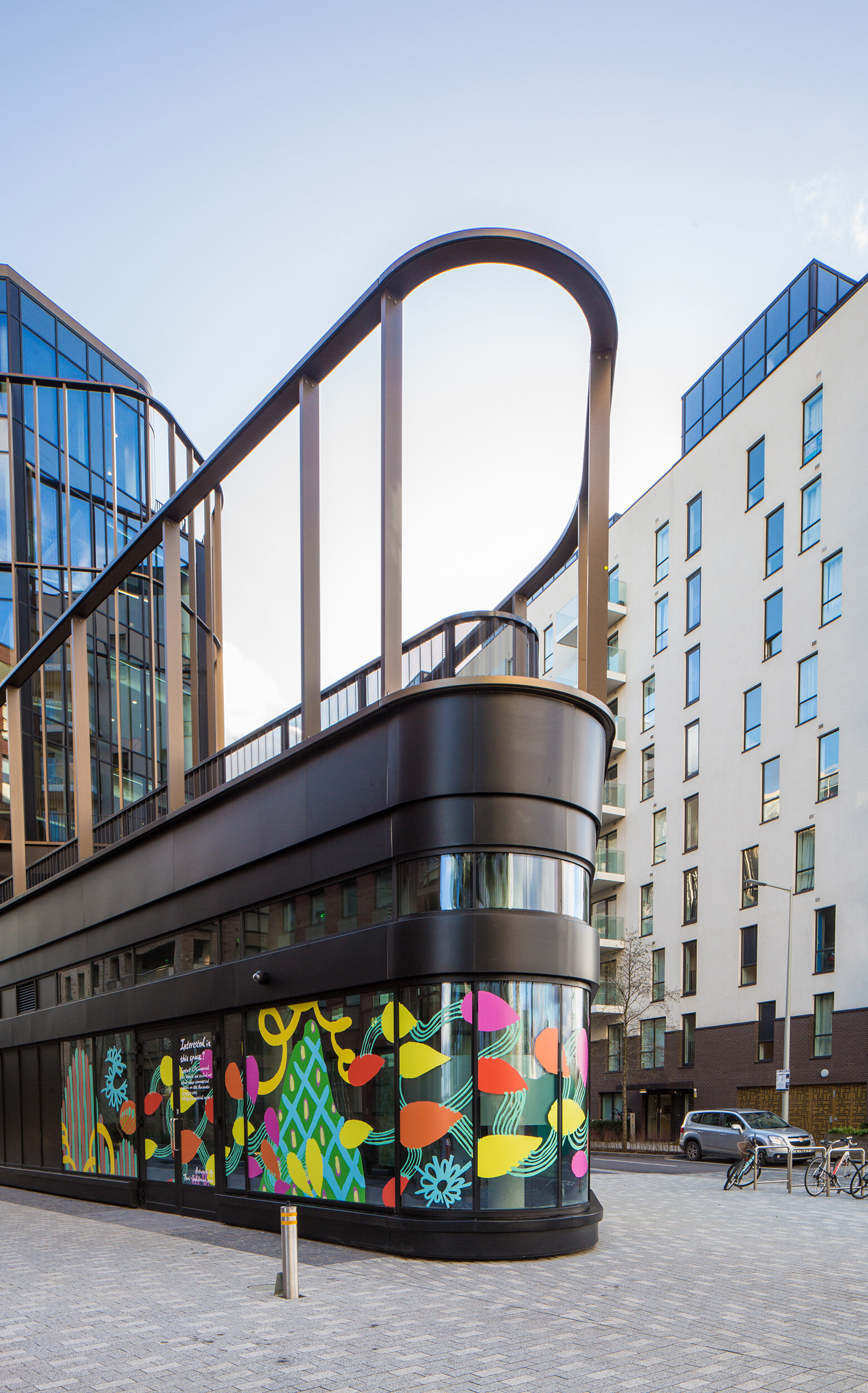 facade vinyl storefront display windows paintings art commission Greenwich Peninsula urban regeneration