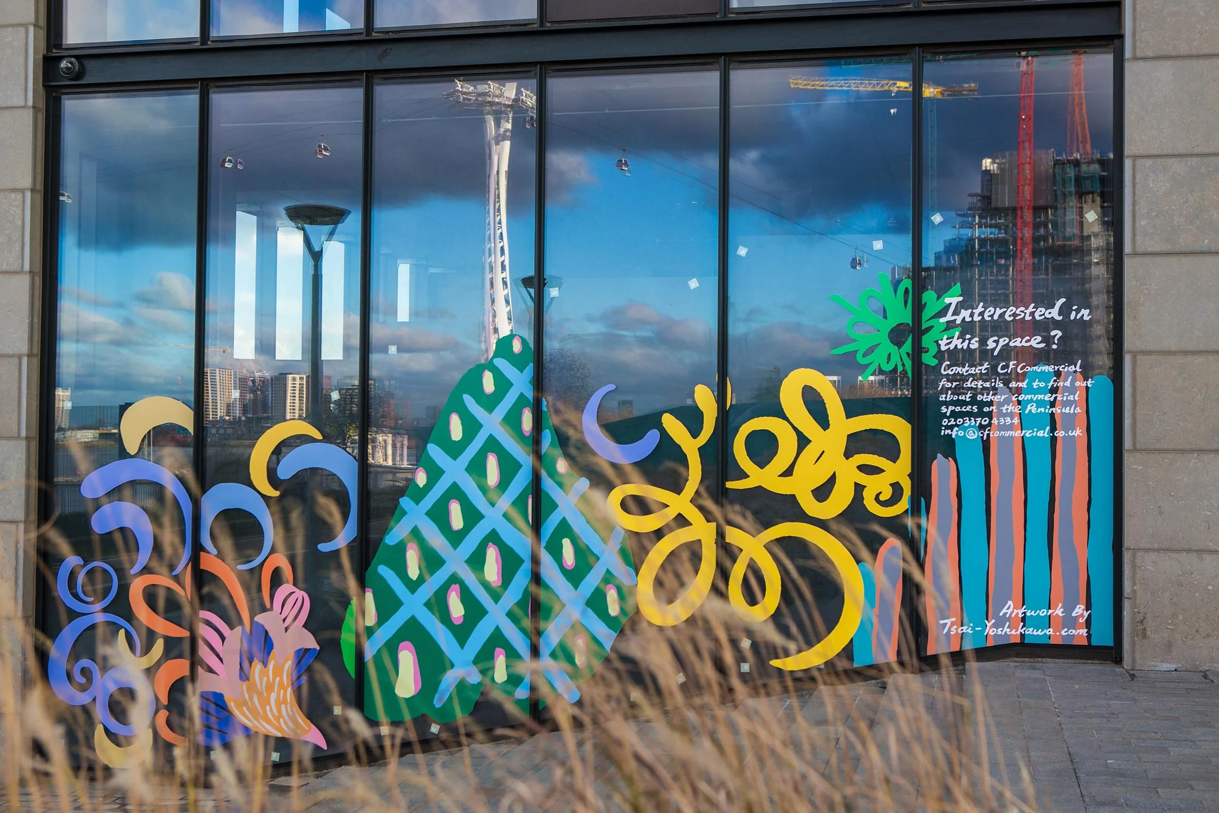 facade vinyl storefront display windows paintings art commission Greenwich Peninsula urban regeneration