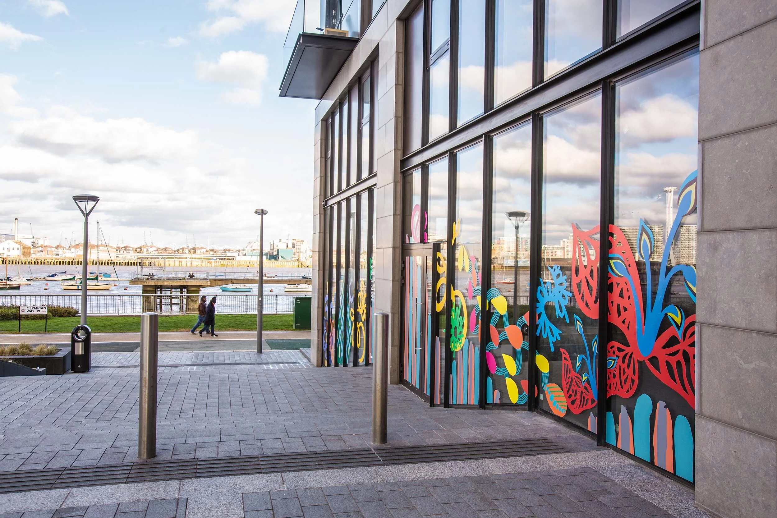 facade vinyl storefront display windows paintings art commission Greenwich Peninsula urban regeneration