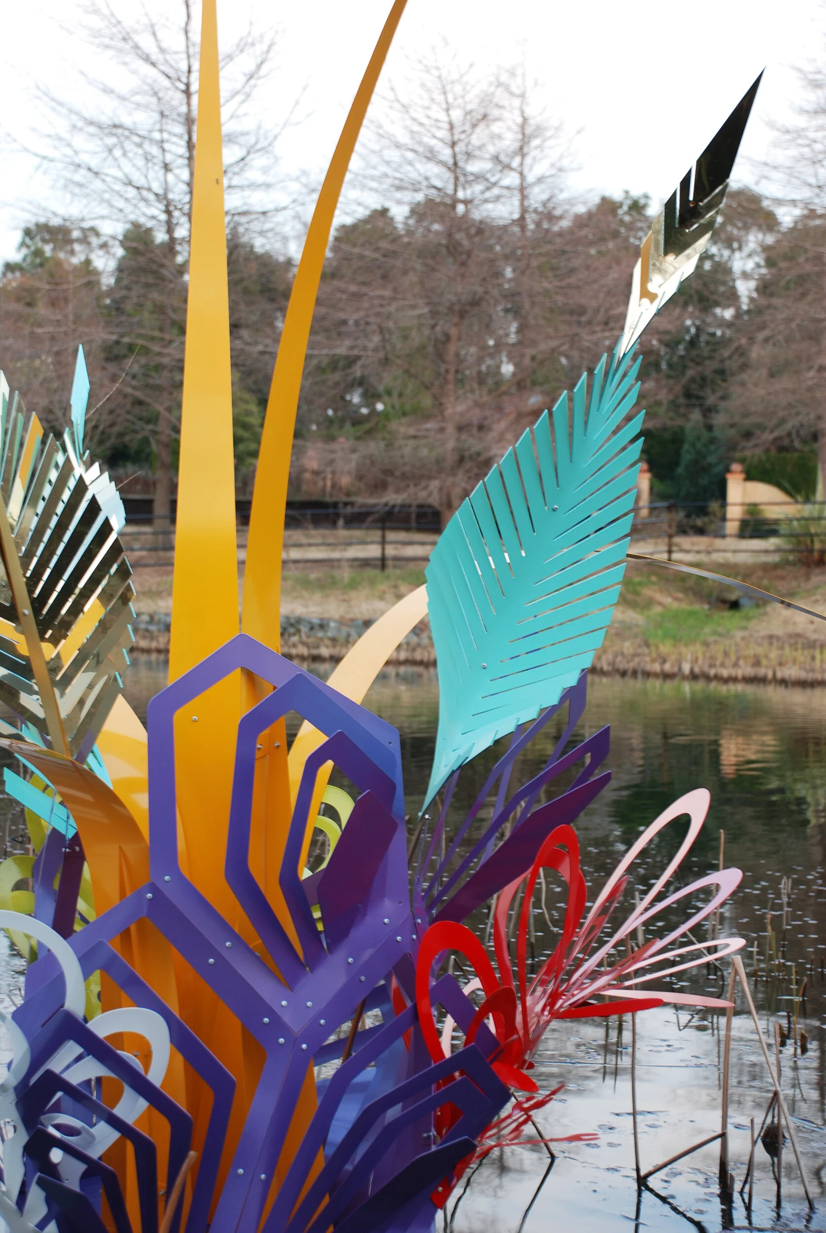 colorful dynamic outdoor lake art installation flower exposition public sculpture water Japan