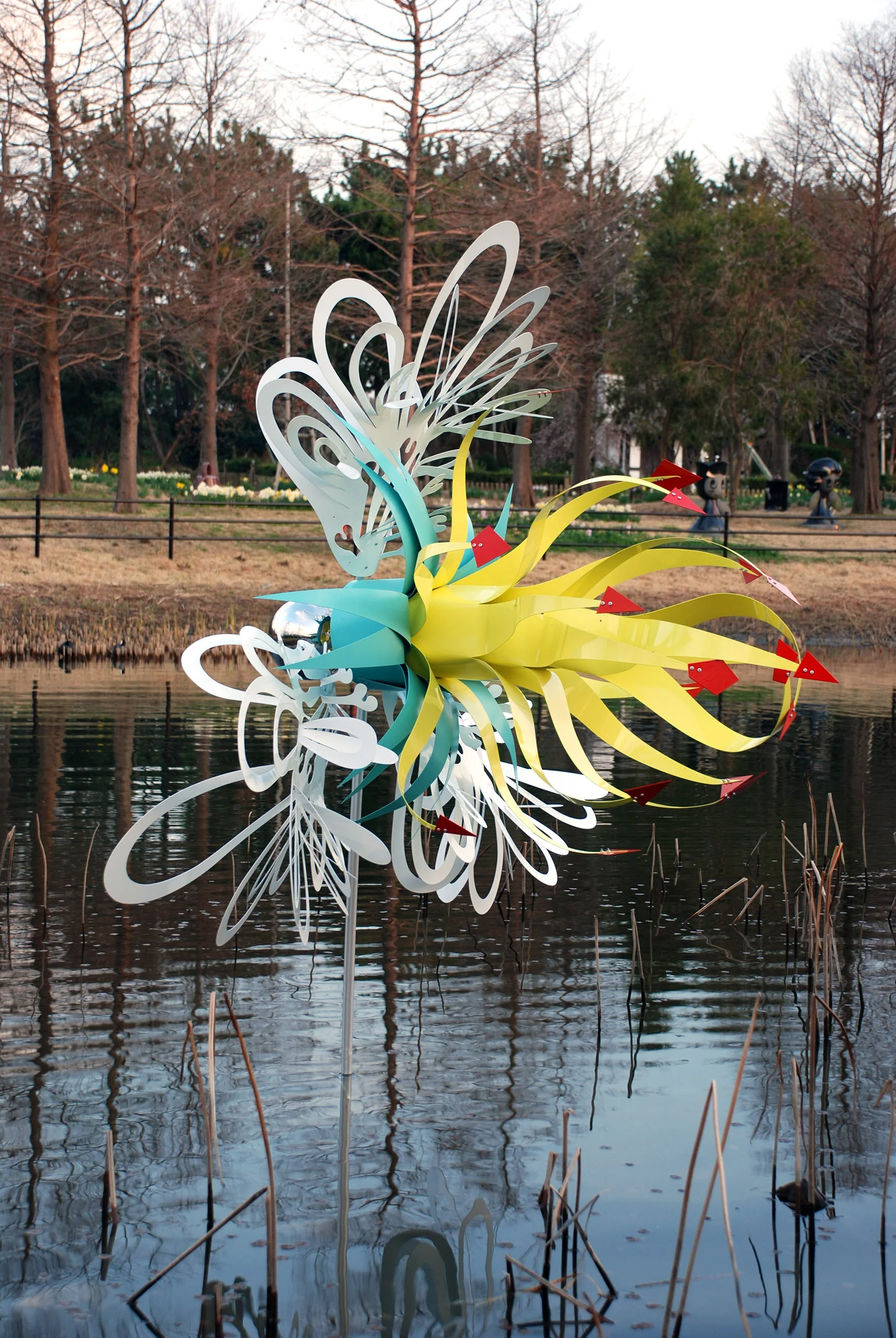 colorful dynamic outdoor lake art installation flower exposition public sculpture water Japan