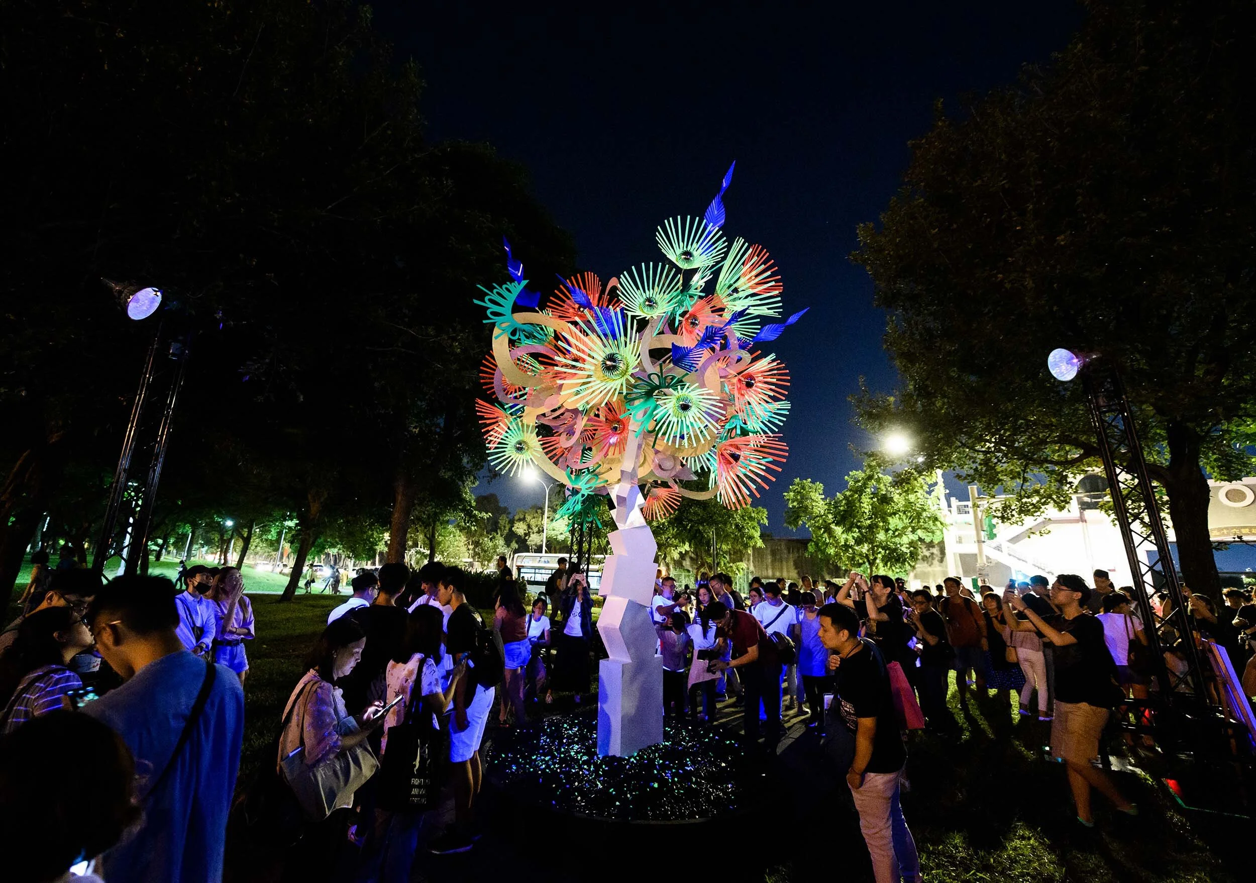 fluorescent bright urban light art tree installation sculpture park garden nuit blanche