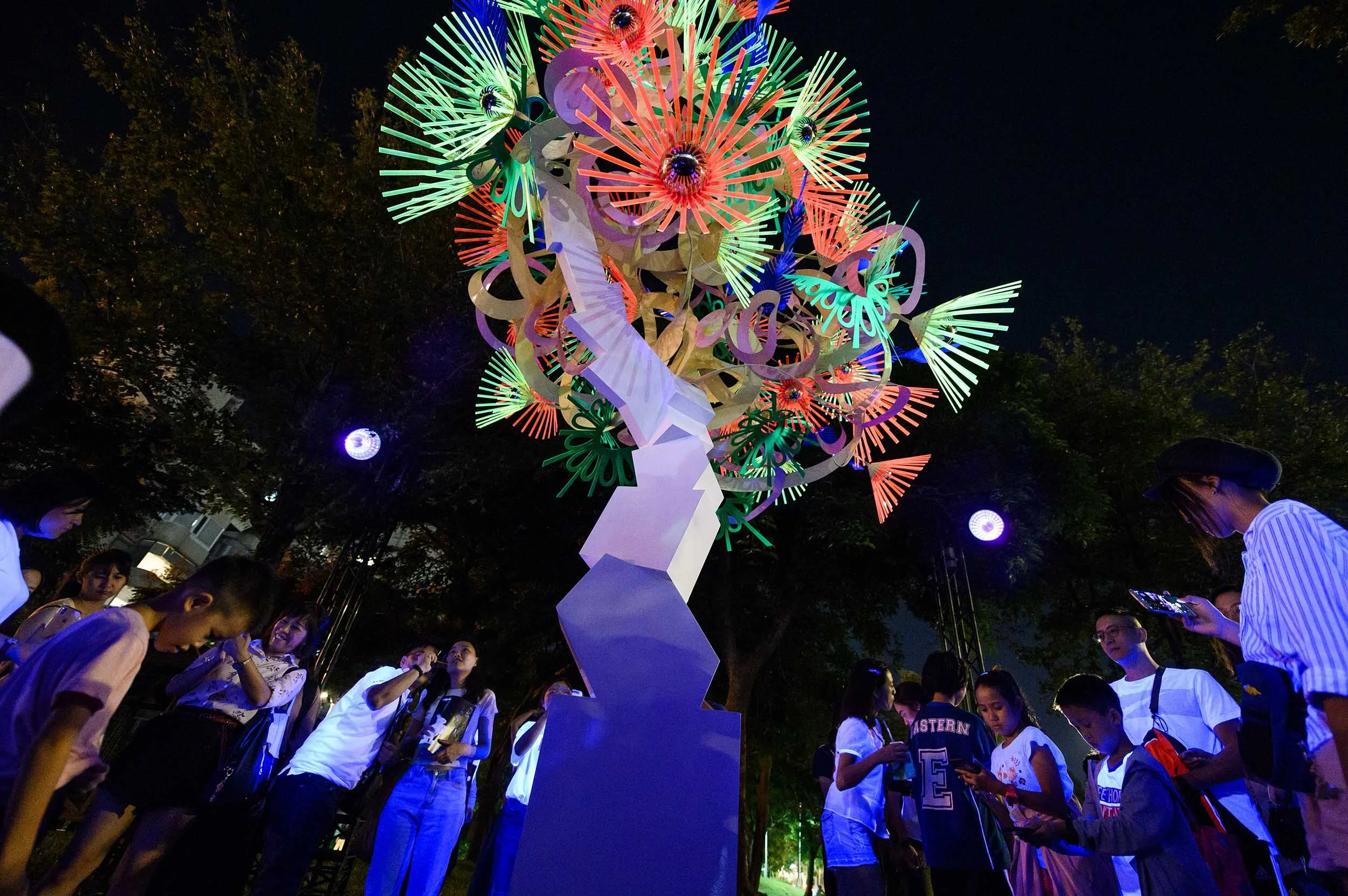 fluorescent bright urban light art tree installation sculpture park garden nuit blanche