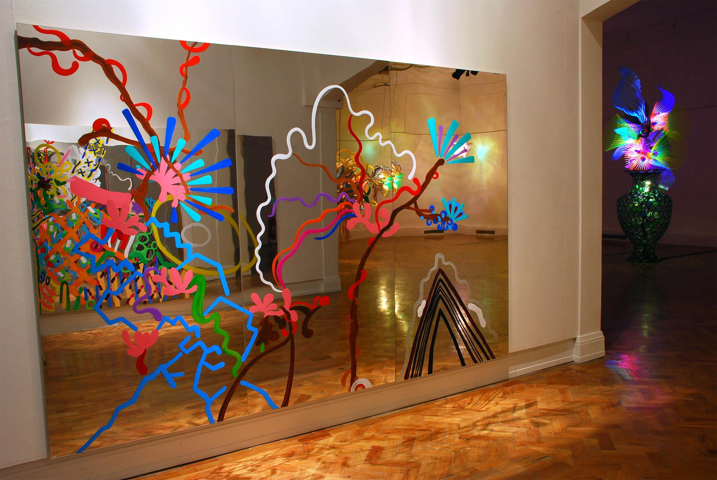dynamic interactive colorful bold infinity mirror painting visual art installation touring exhibitions