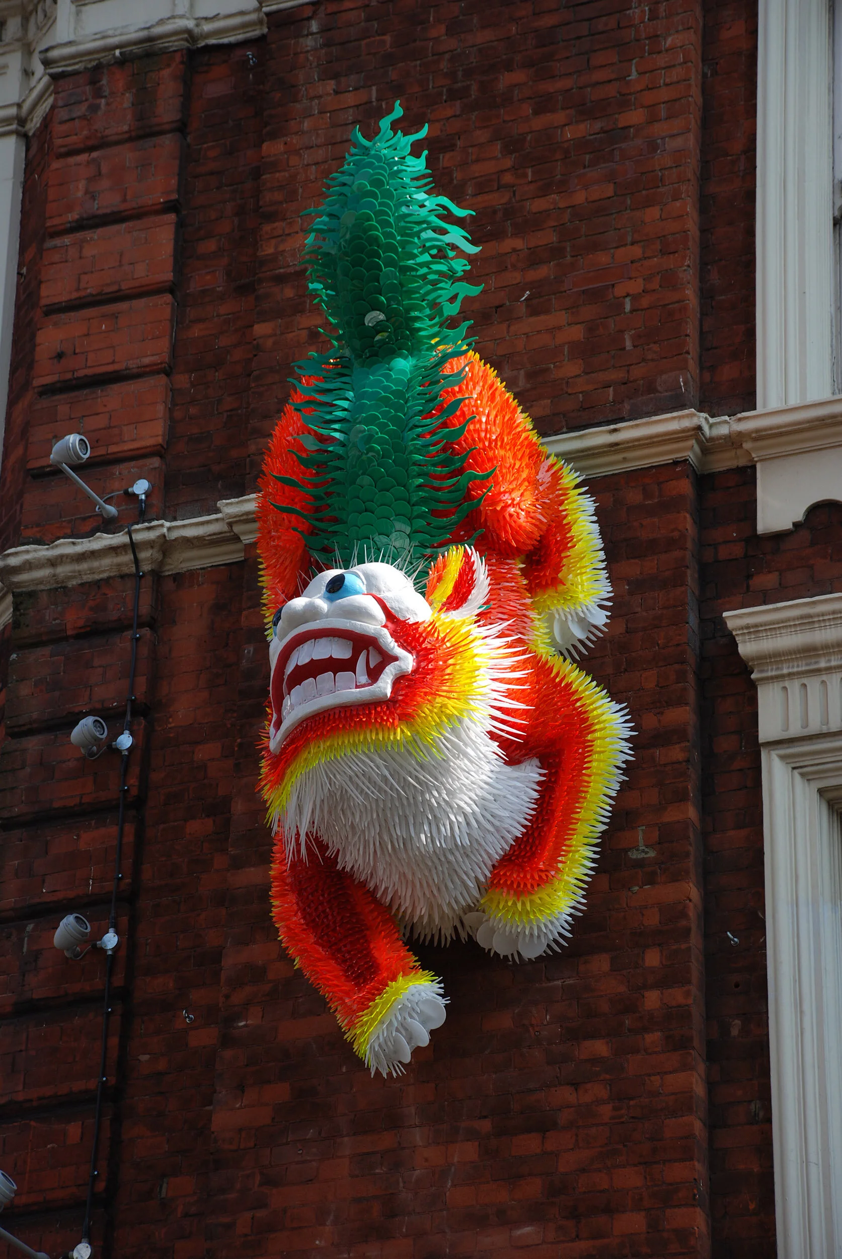 Chinese lion dragon bright colorful animal landmark public art sculpture London Chinatown