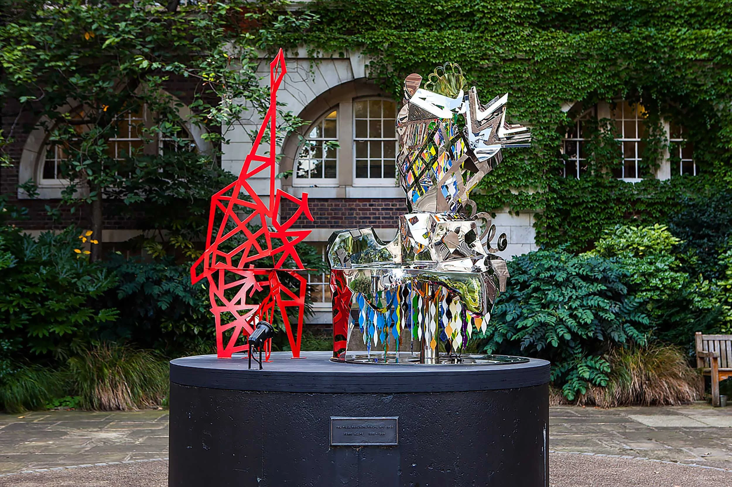 abstract figure polished stainless sculpture chair Henry Moore plinth art project Chelsea 