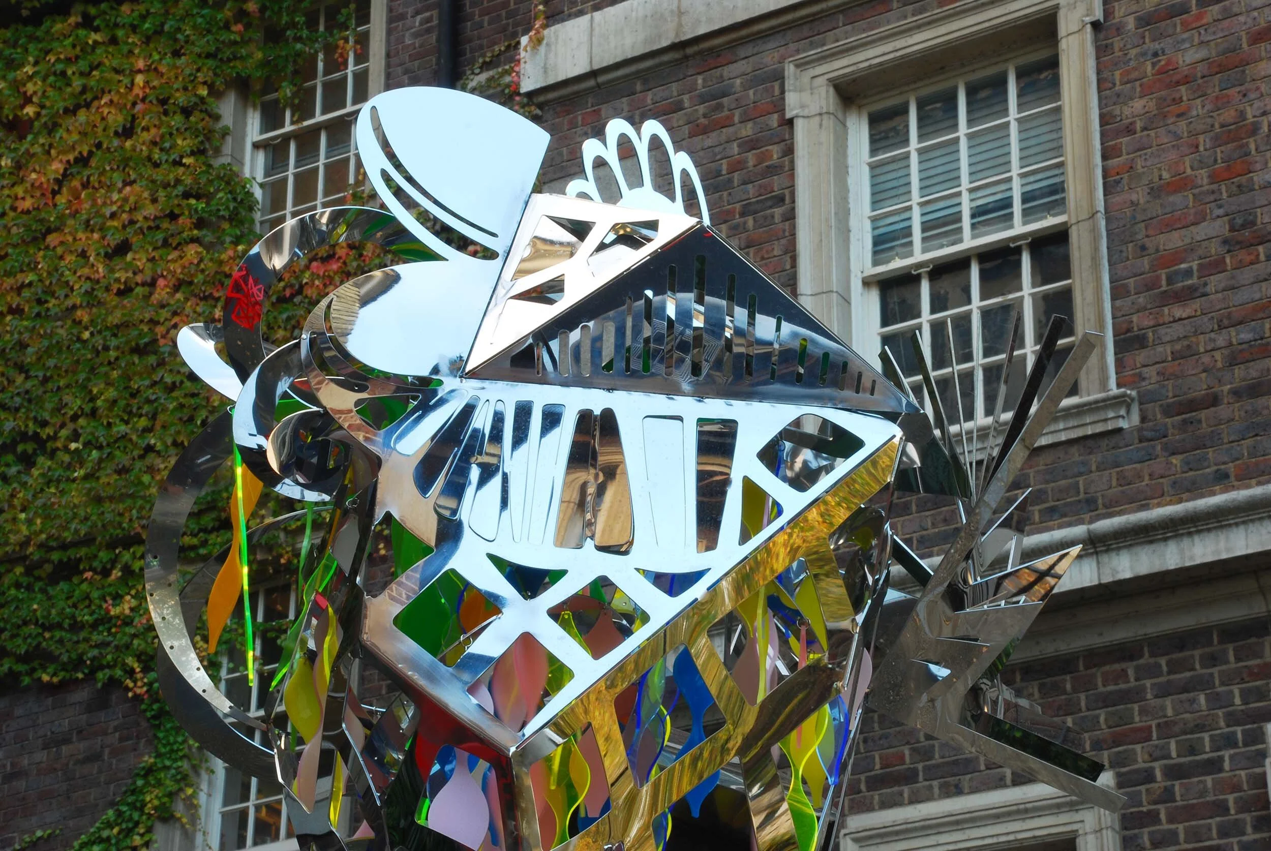 abstract figure polished stainless sculpture chair Henry Moore plinth art project Chelsea