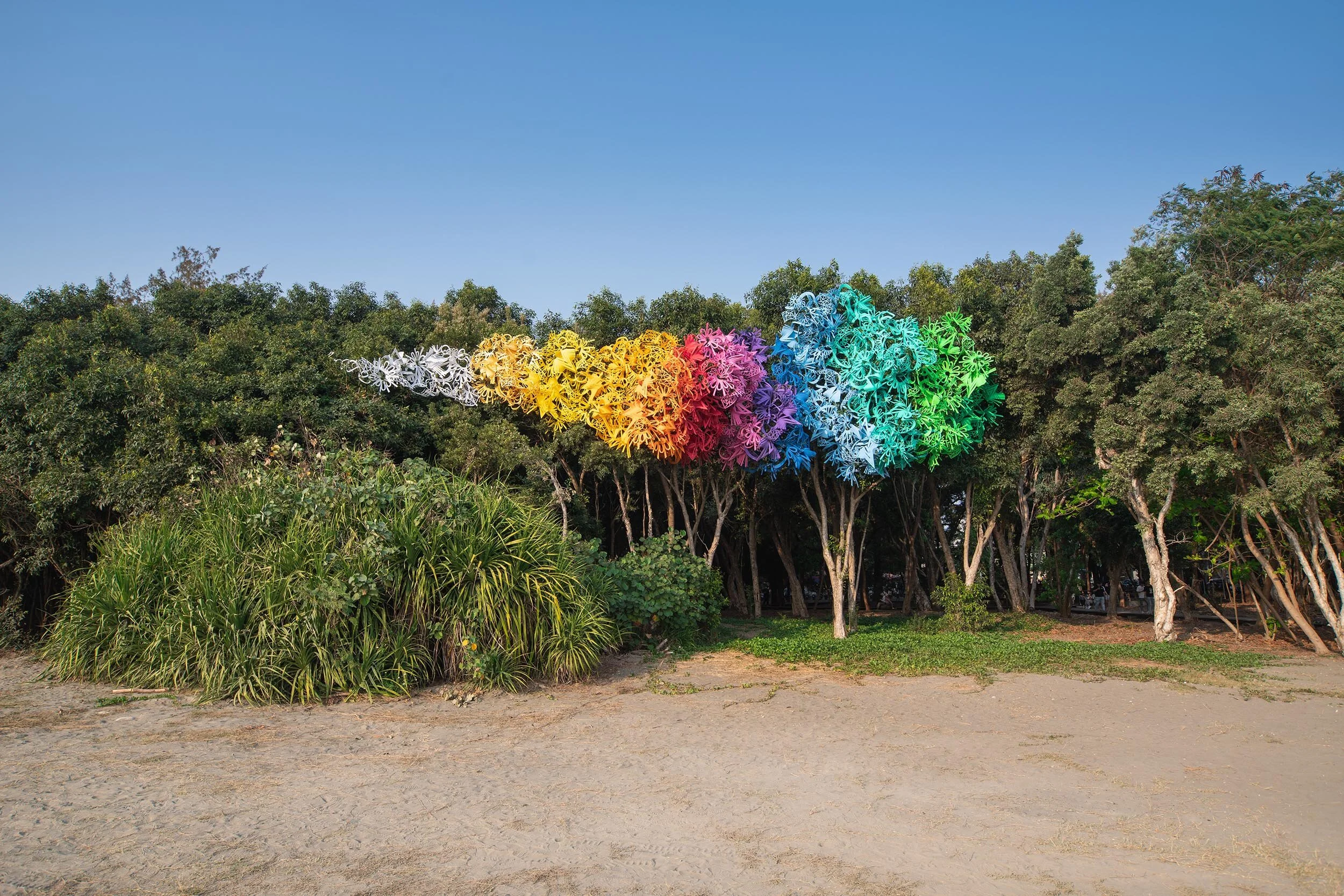 dynamic colorful bold outdoor art installation tree sculpture public beach Yuguang Island Festival Tainan Taiwan