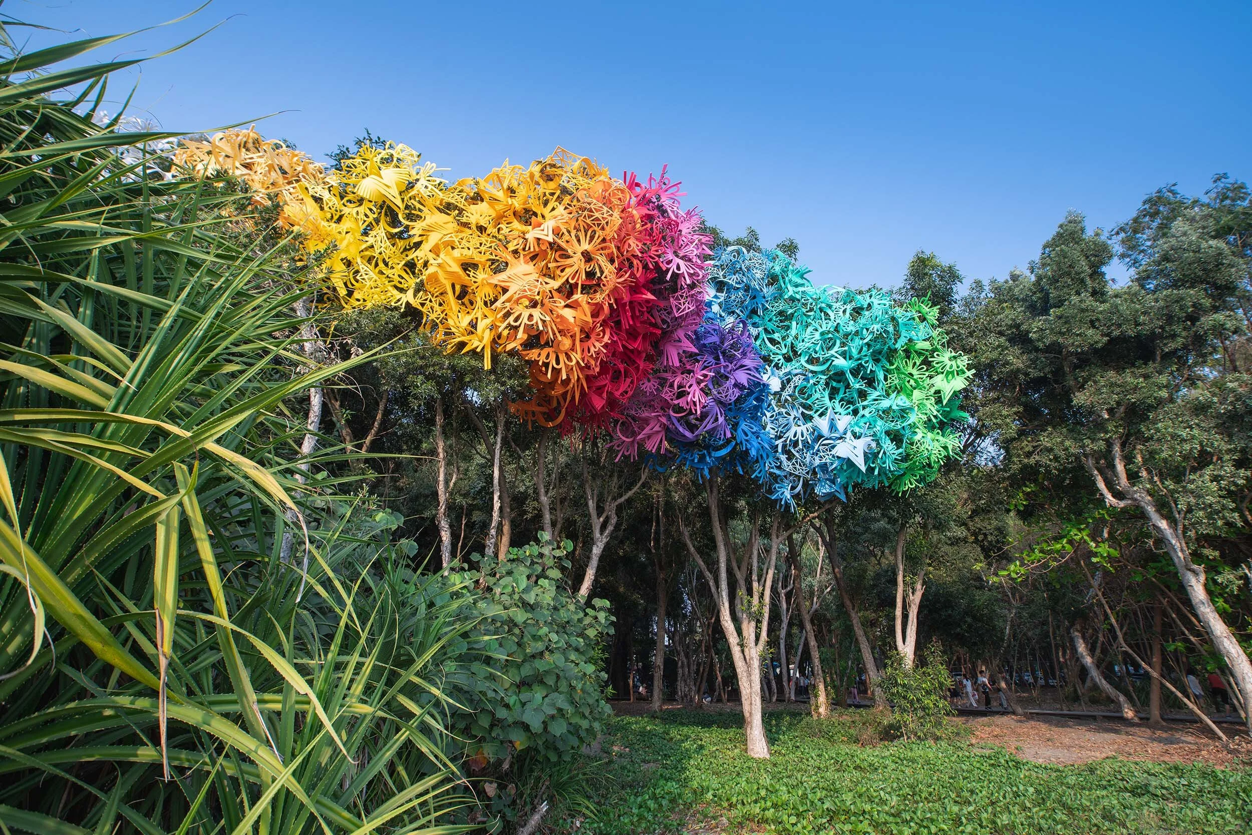 dynamic colorful bold outdoor art installation tree sculpture public beach Yuguang Island Festival Tainan Taiwan