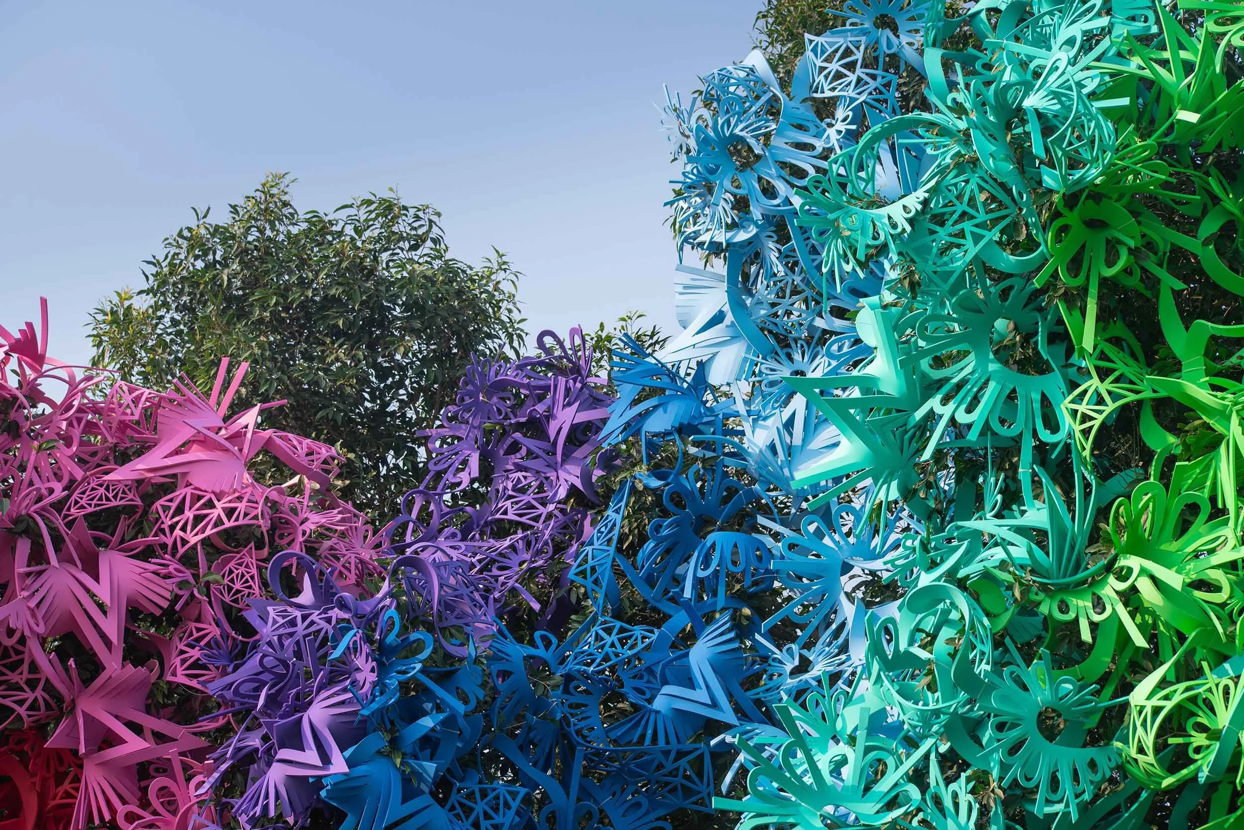 dynamic colorful bold outdoor art installation tree sculpture public beach Yuguang Island Festival Tainan Taiwan