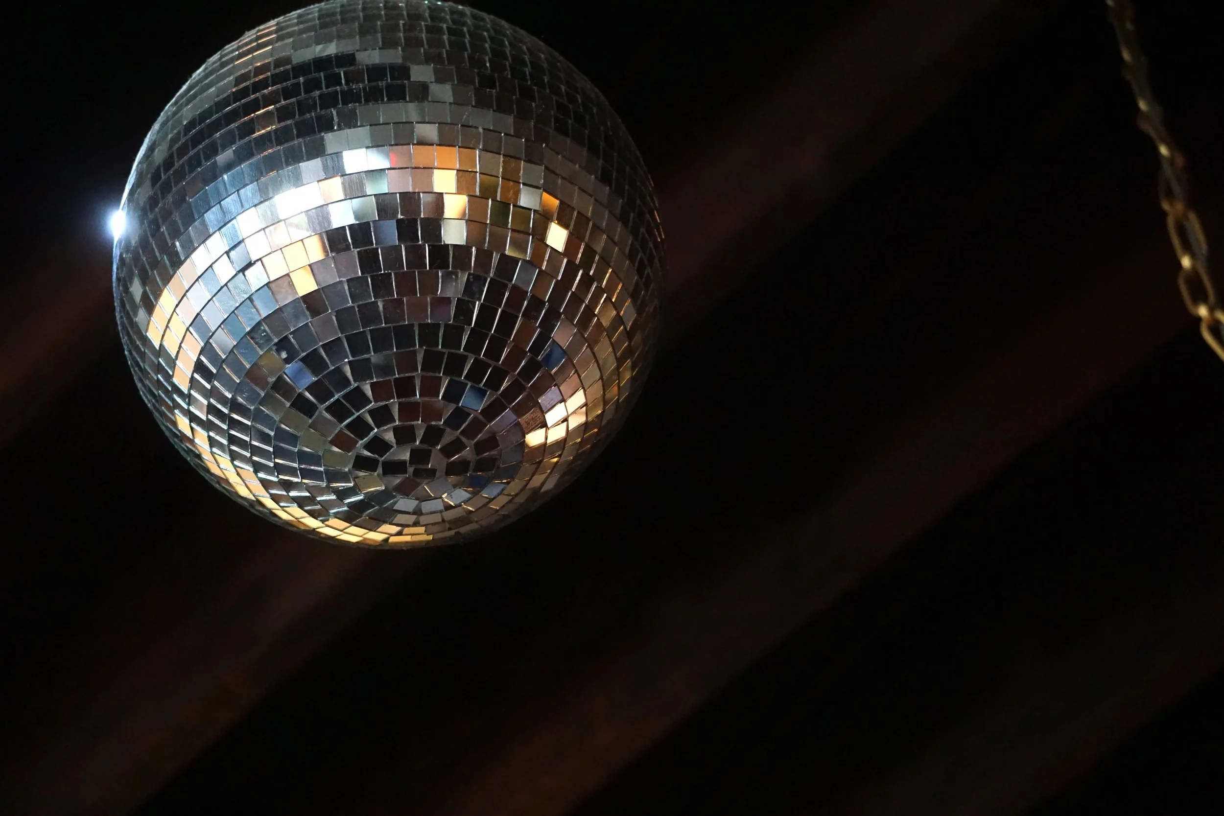  A mirror ball hanging from the ceiling of James Beard Award nominated East Nashville restaurant, Lockeland Table. It comes in handy during our special events for New Years Eve. 