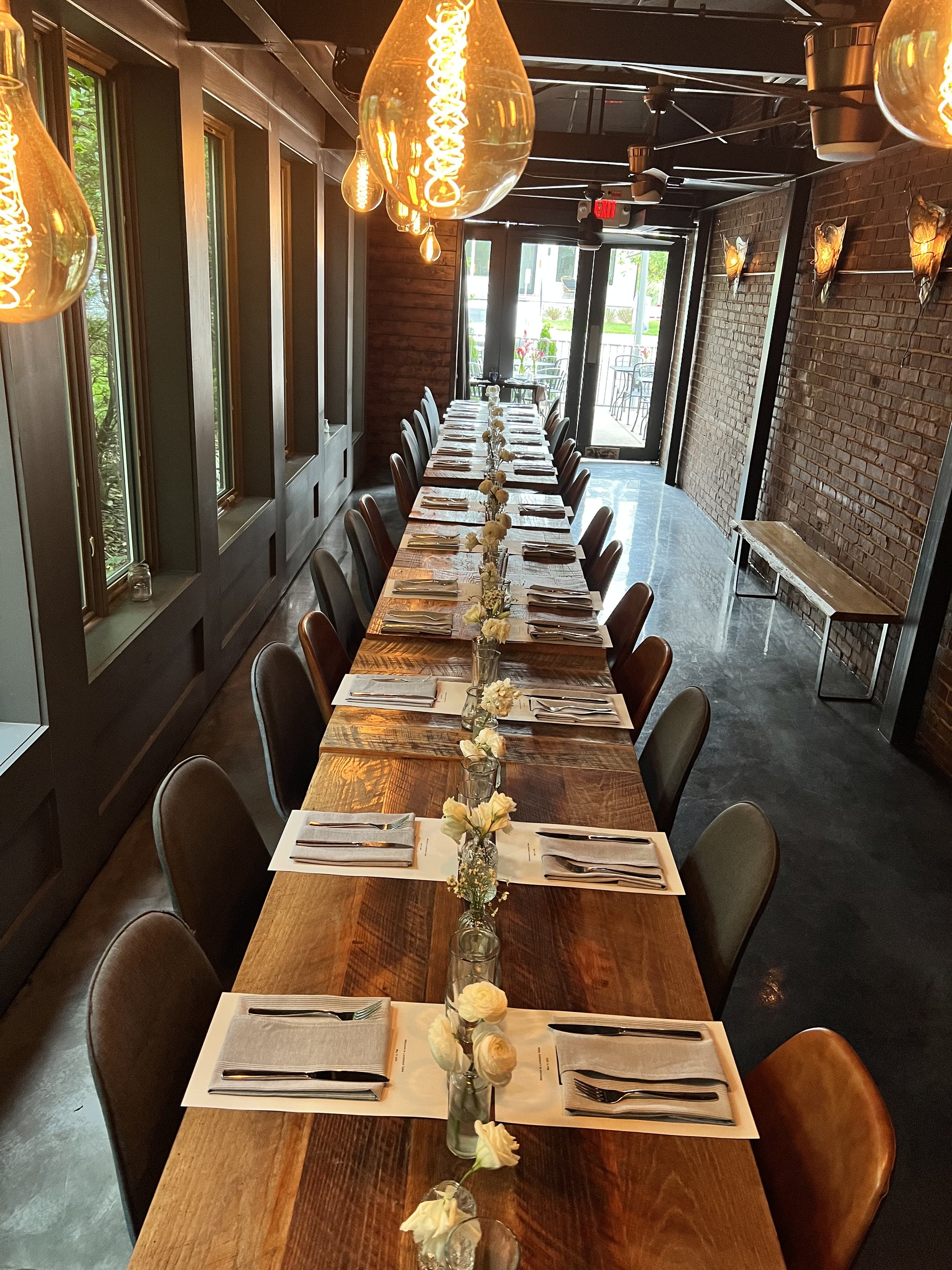 A shot of the climate-controlled event space at James Beard Award nominated East Nashville restaurant, Lockeland Table. It seats many. Book your next event here!