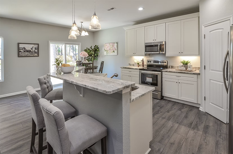 View of kitchen island looking at oven