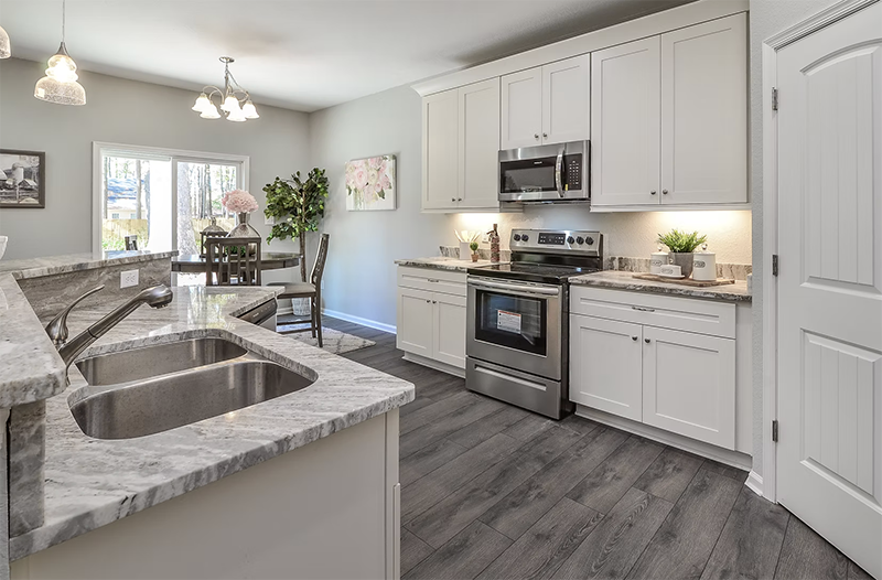 Kitchen sink view looking at oven