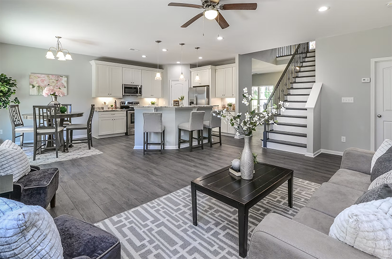 View from corner of living space looking into the open kitchen