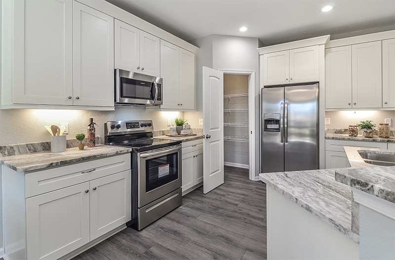 View of kitchen from dining space