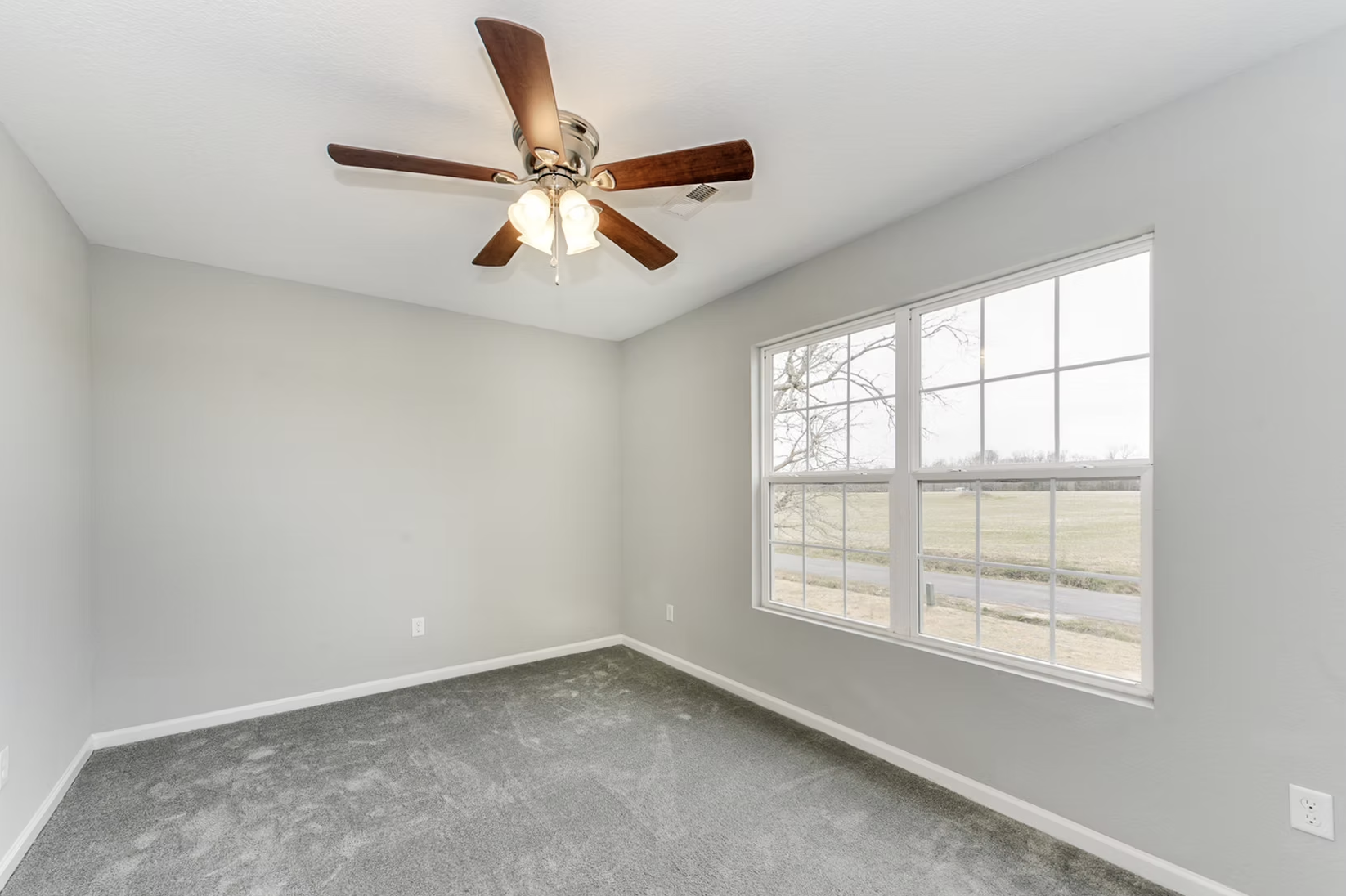 View into carpeted bedroom